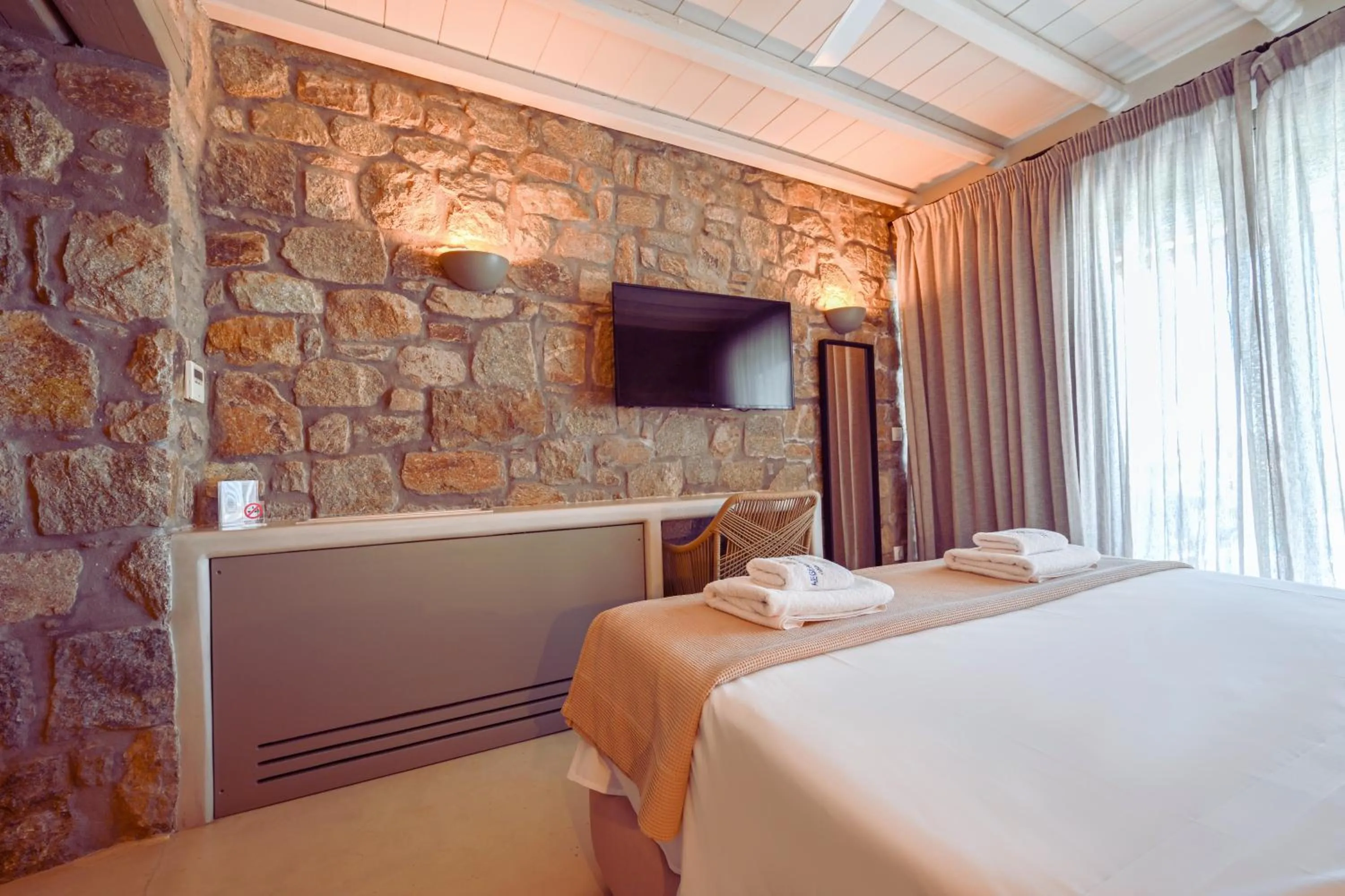 Bed in Aegean Hospitality