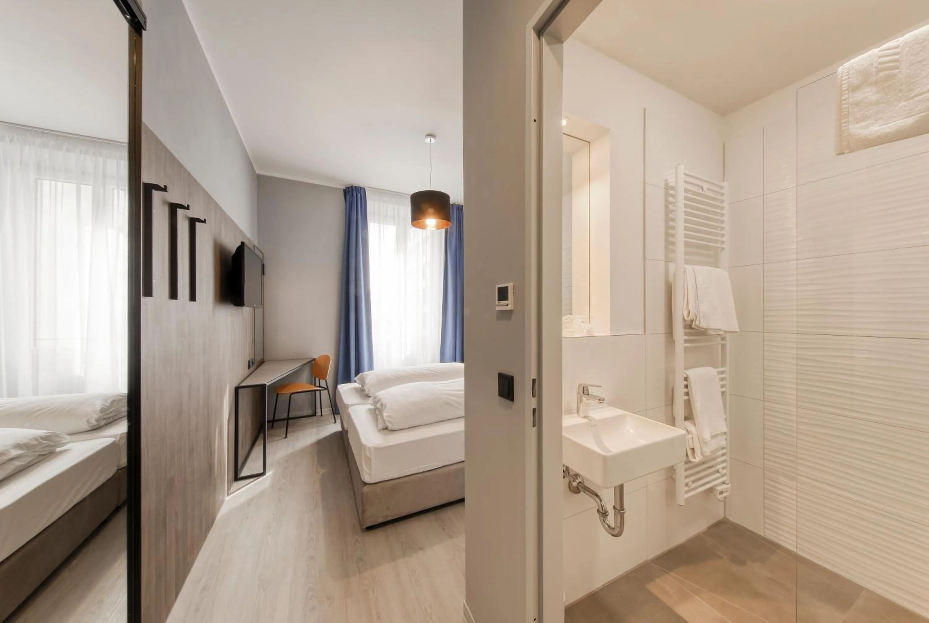 Bed in Smart Stay Hotel Station