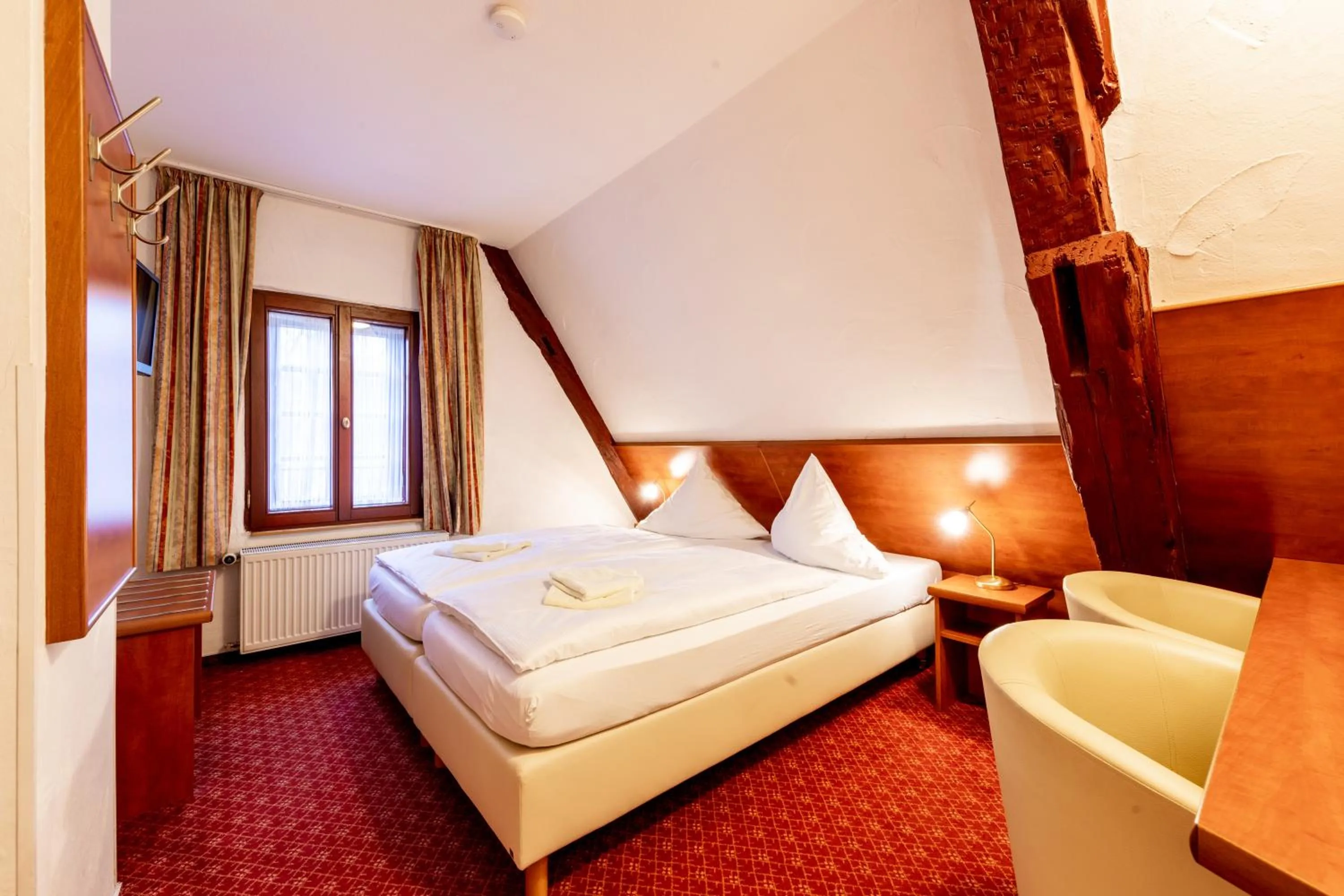 Photo of the whole room, Bed in Ringhotel Jägerhof