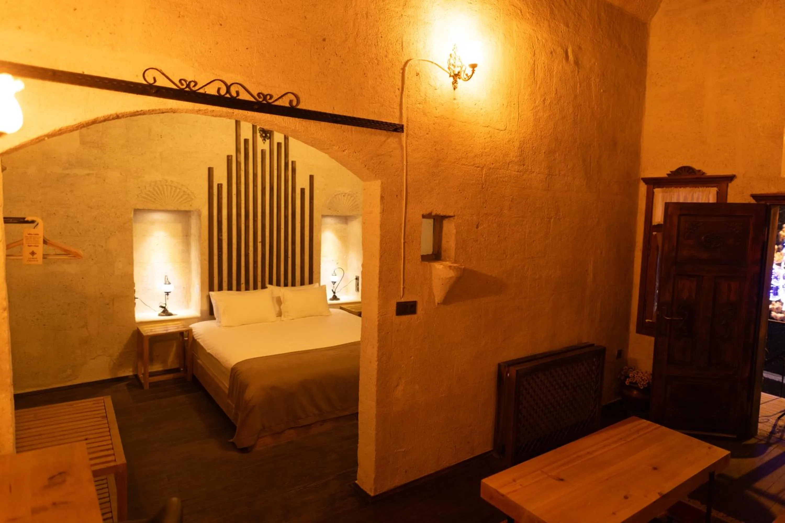 Bed in Lemon Cave Suites