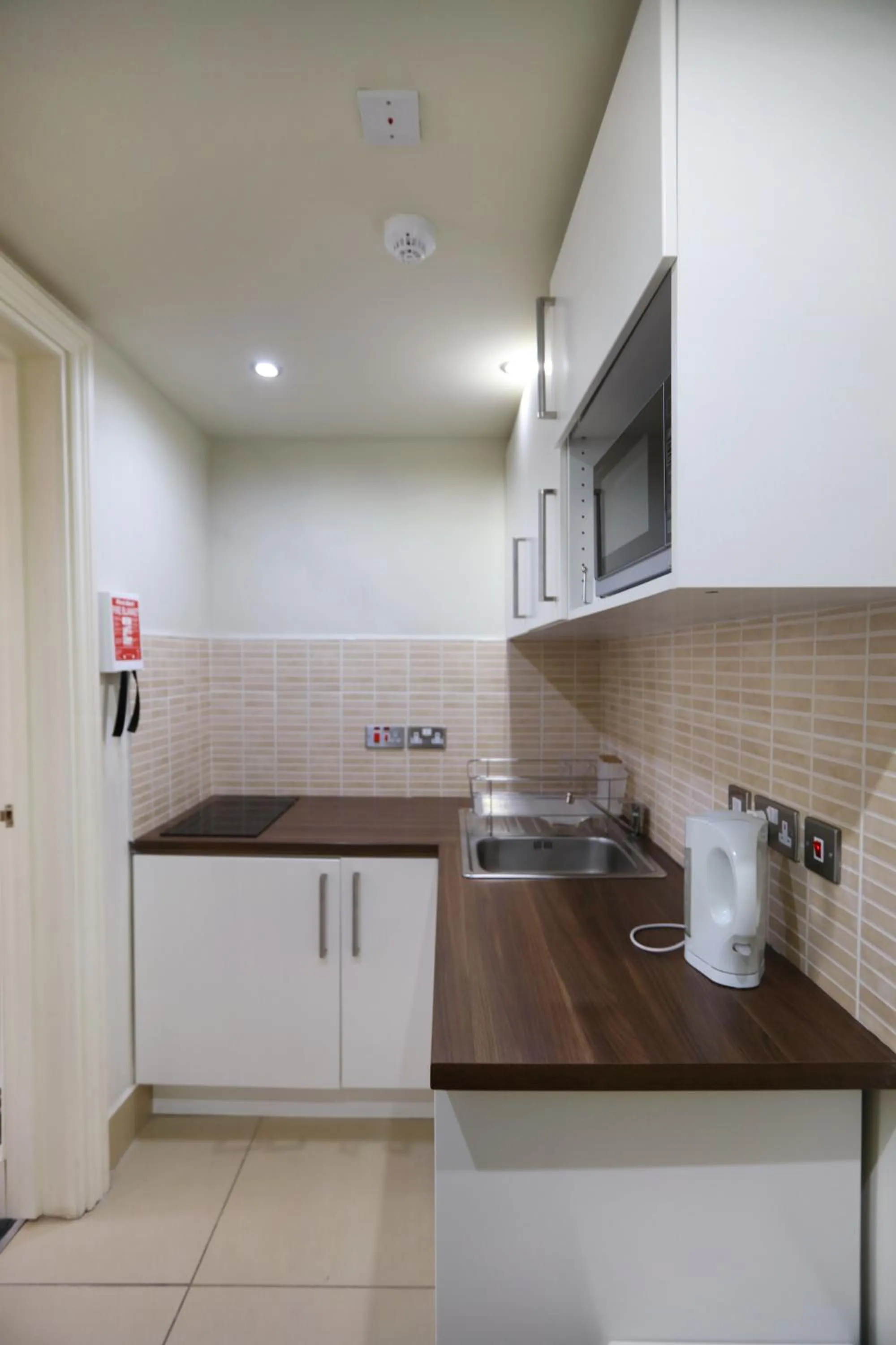 Kitchen or kitchenette in Palmerston Suites