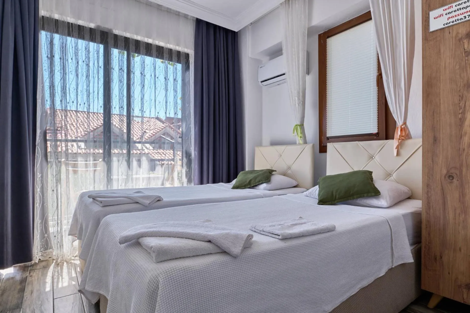 Bed in CARETTA PANSİYOn