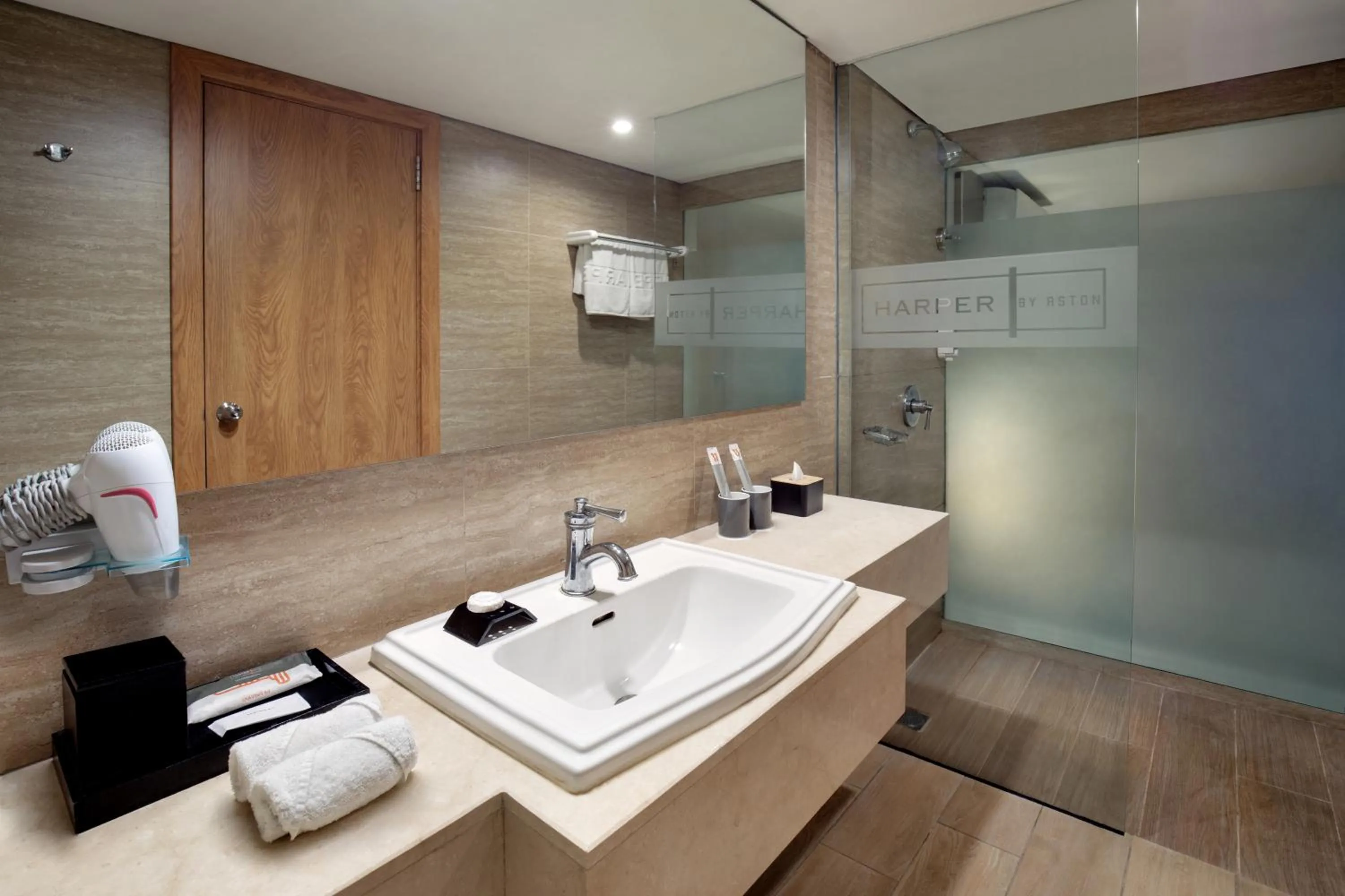 Bathroom in Harper Kuta Hotel by ASTON