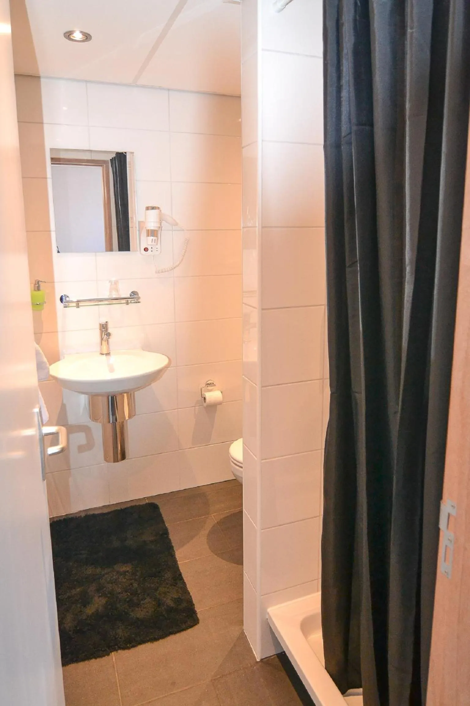 Bathroom in Hotel Bienvenue