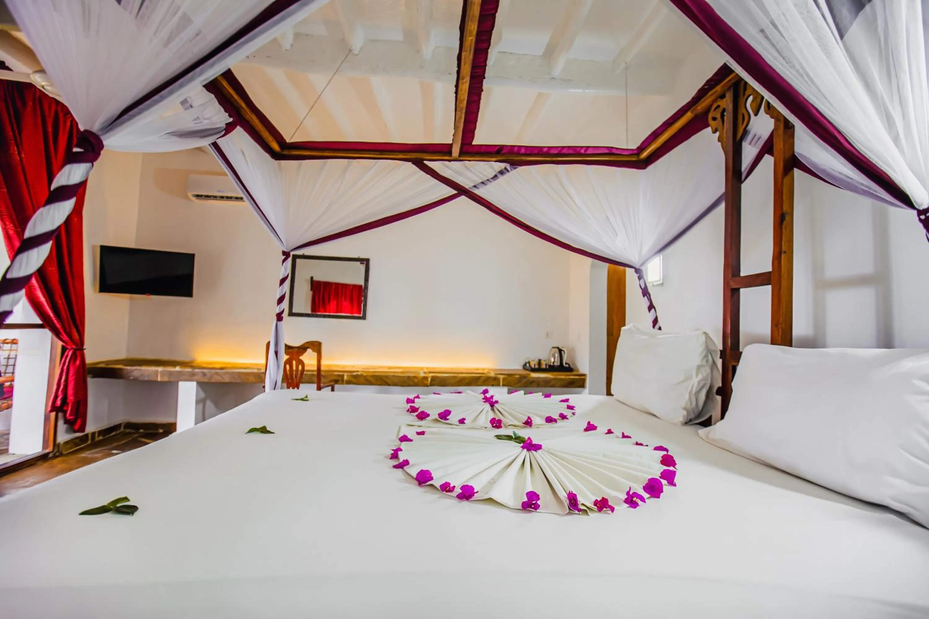 Bed in AHG Waridi Beach Resort &amp; SPA