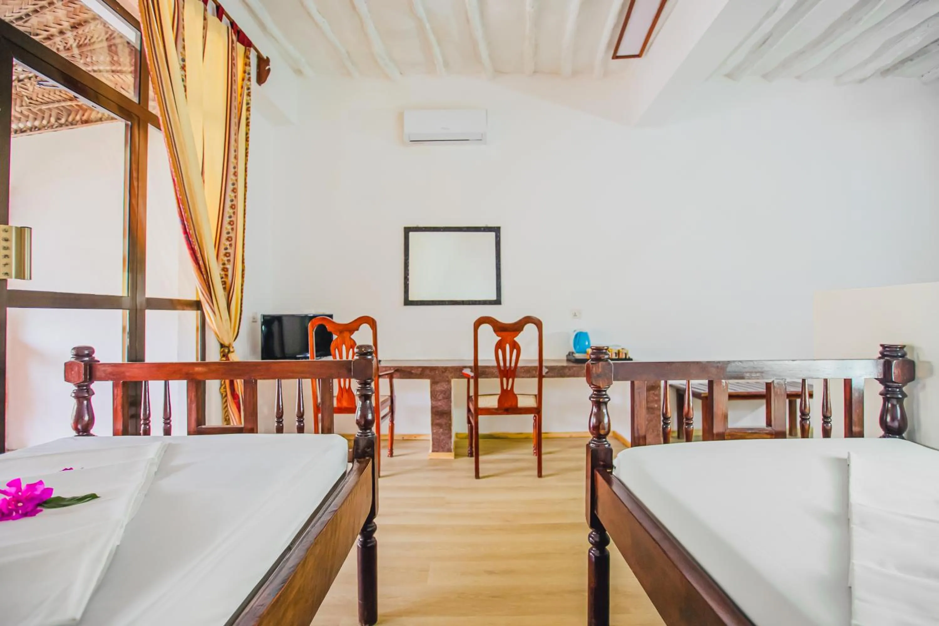 Bed in AHG Waridi Beach Resort &amp; SPA