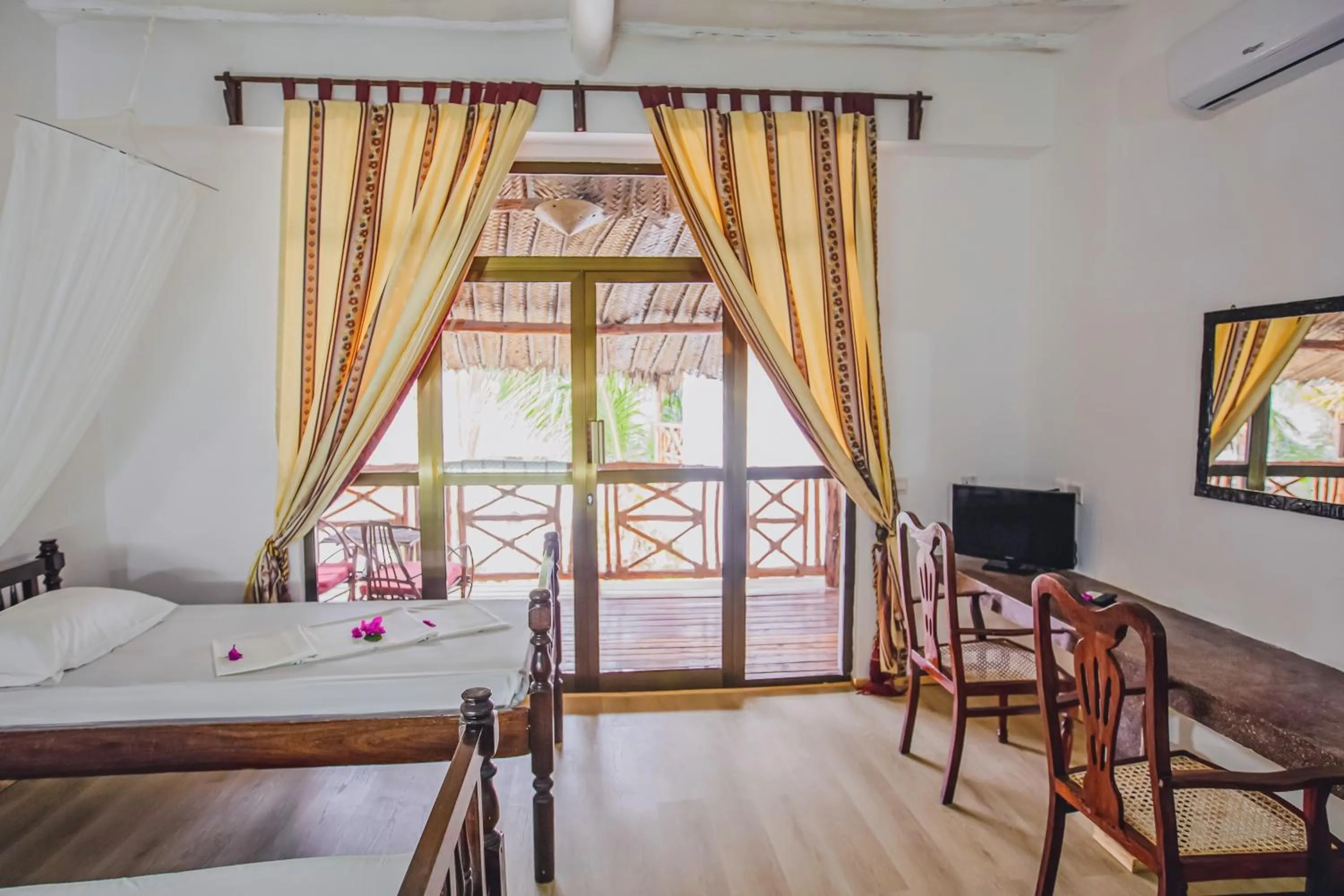 Bed in AHG Waridi Beach Resort &amp; SPA