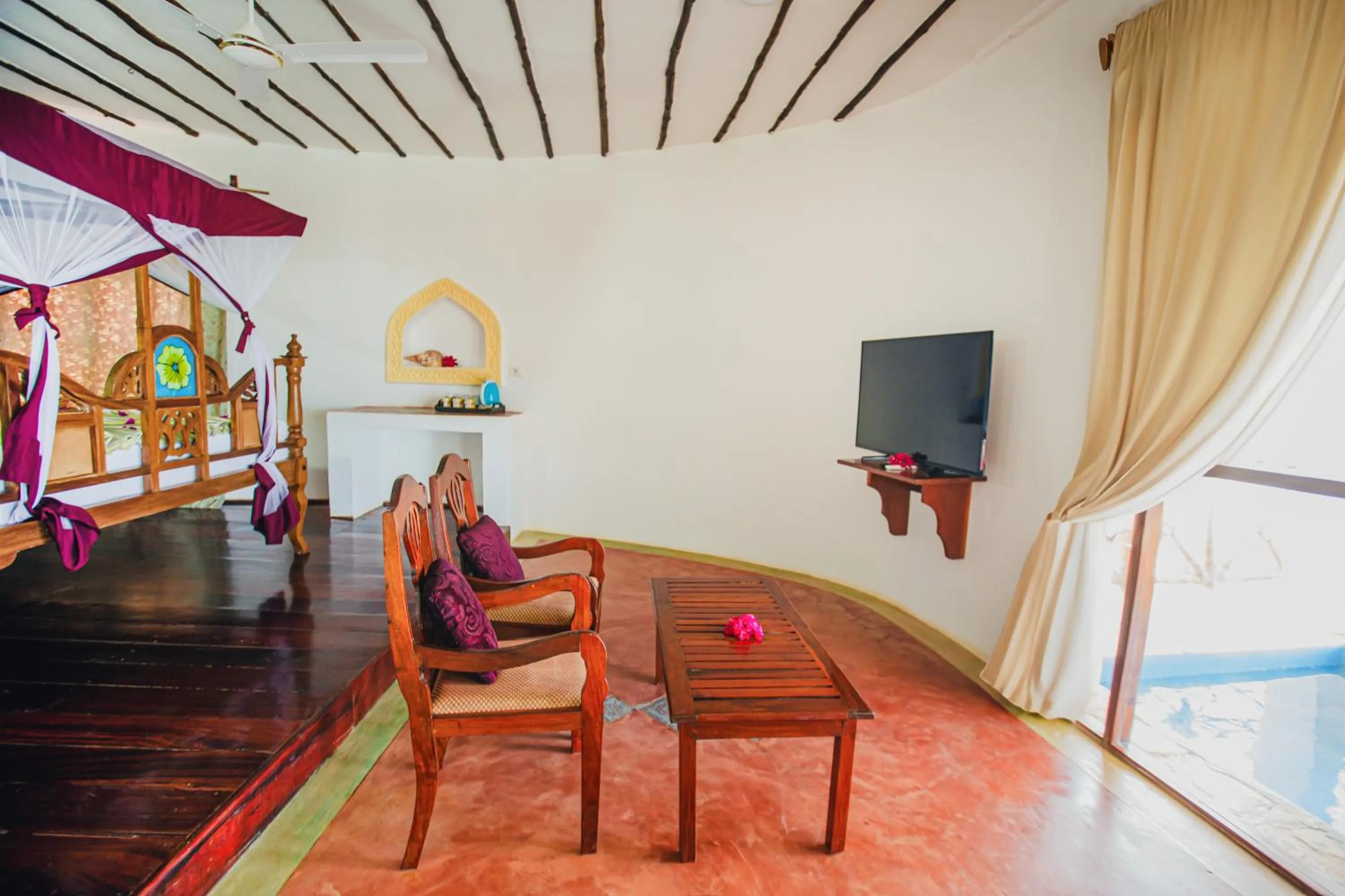 Communal lounge/ TV room in AHG Waridi Beach Resort &amp; SPA