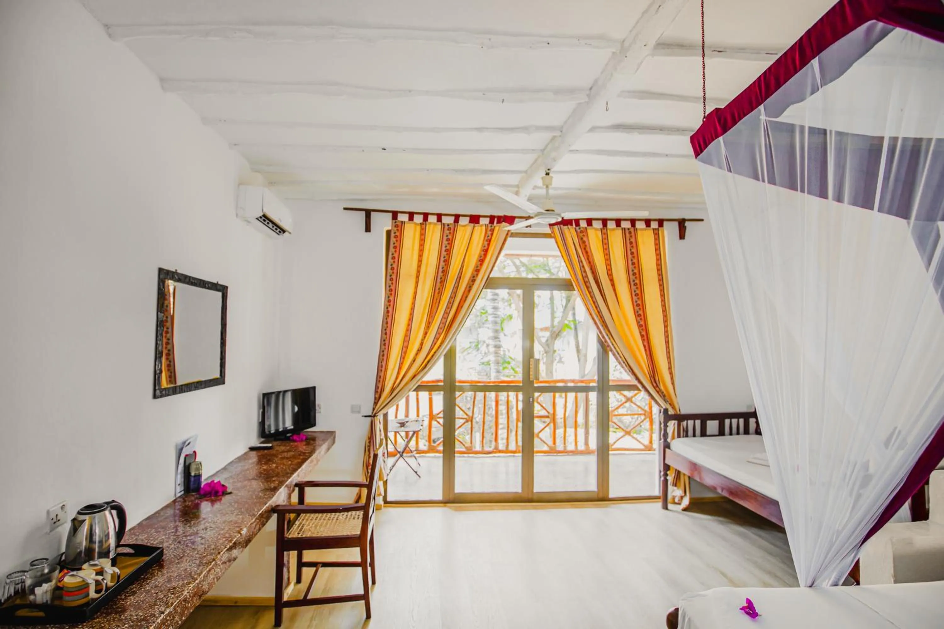 Photo of the whole room, Bed in AHG Waridi Beach Resort &amp; SPA