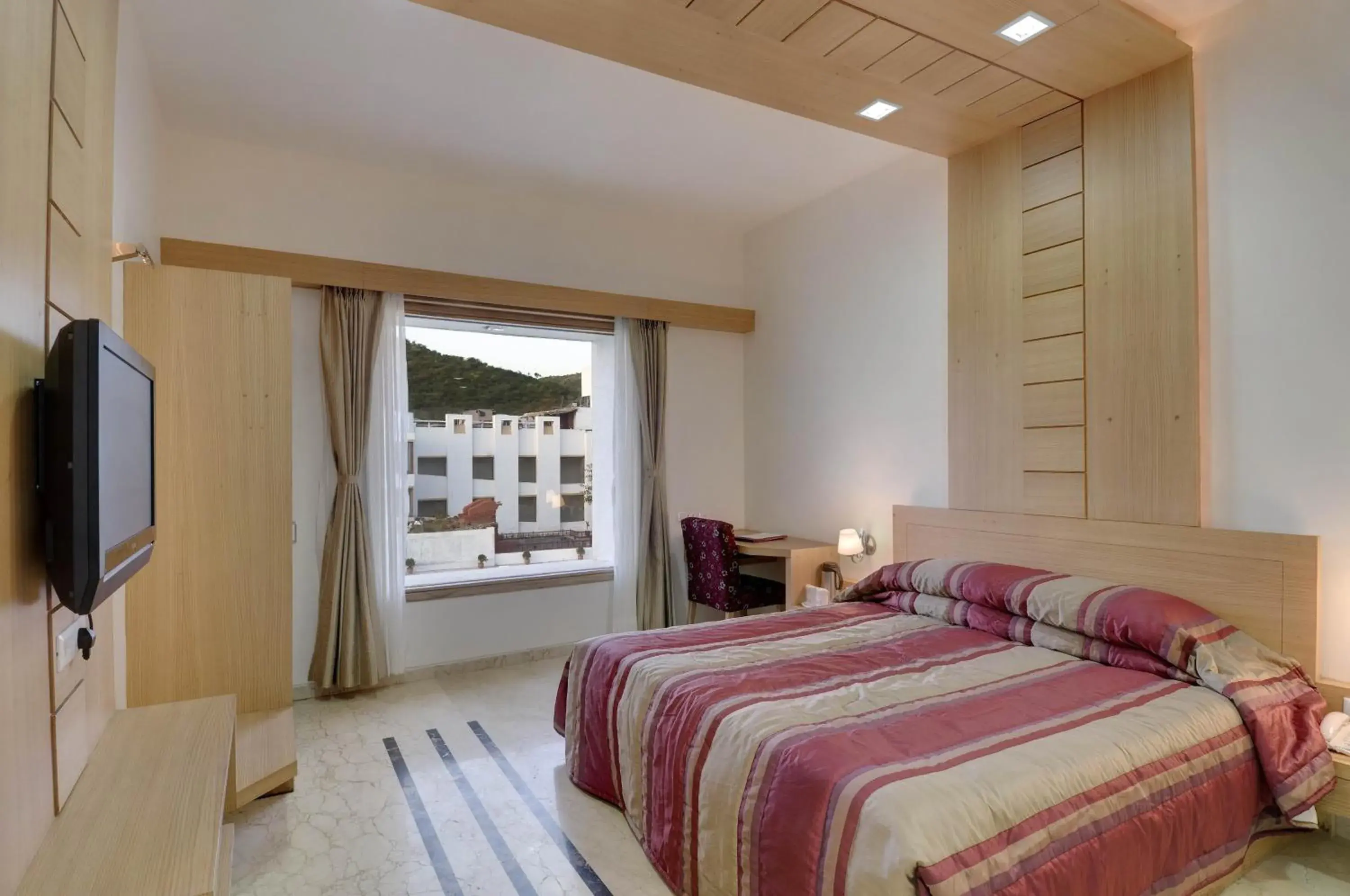 Bedroom, Bed in Inder Residency Resort & Spa Udaipur Bedroom, Bed in Inder Residency Resort & Spa Udaipur