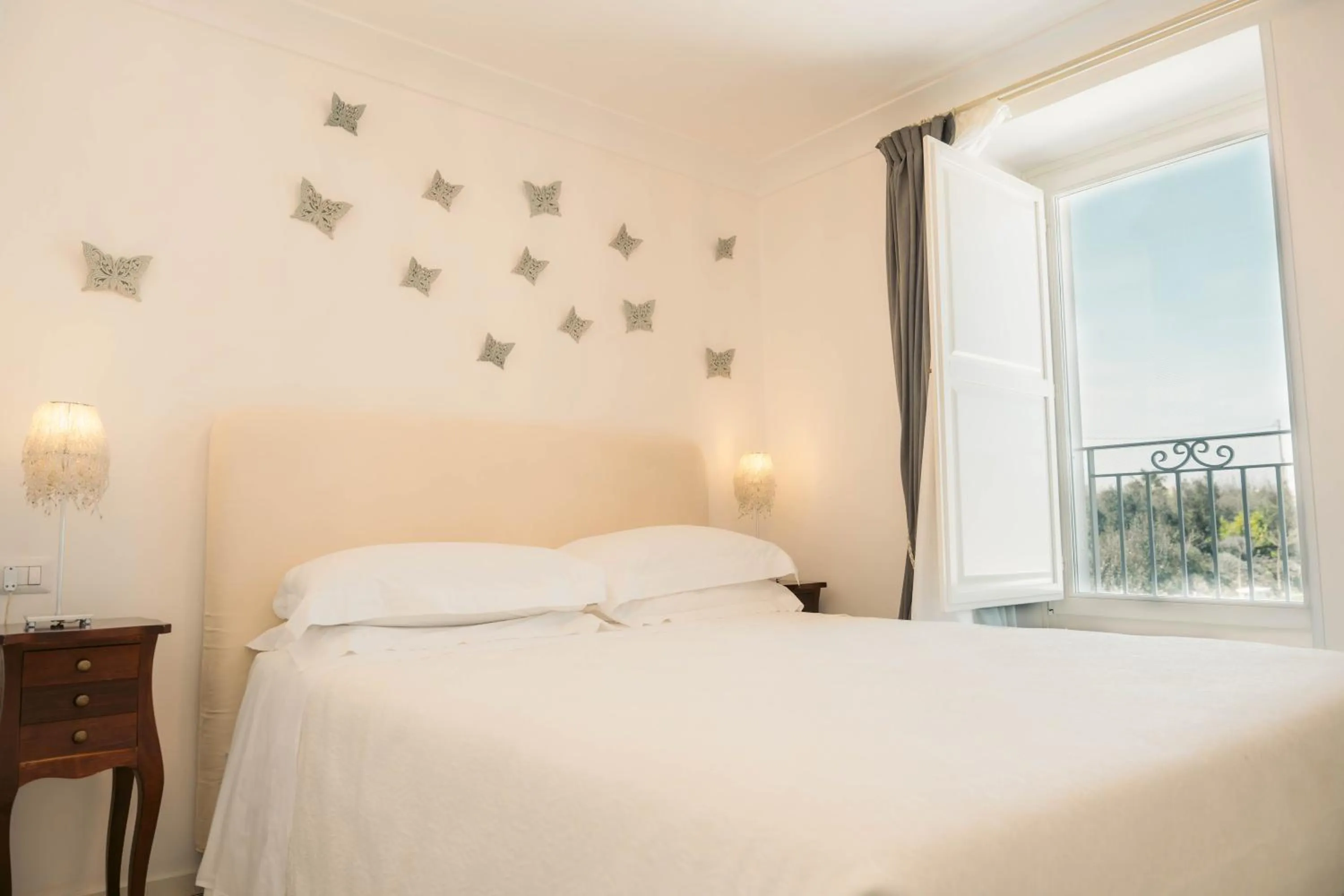 Bed in Leonardo Trulli Resort