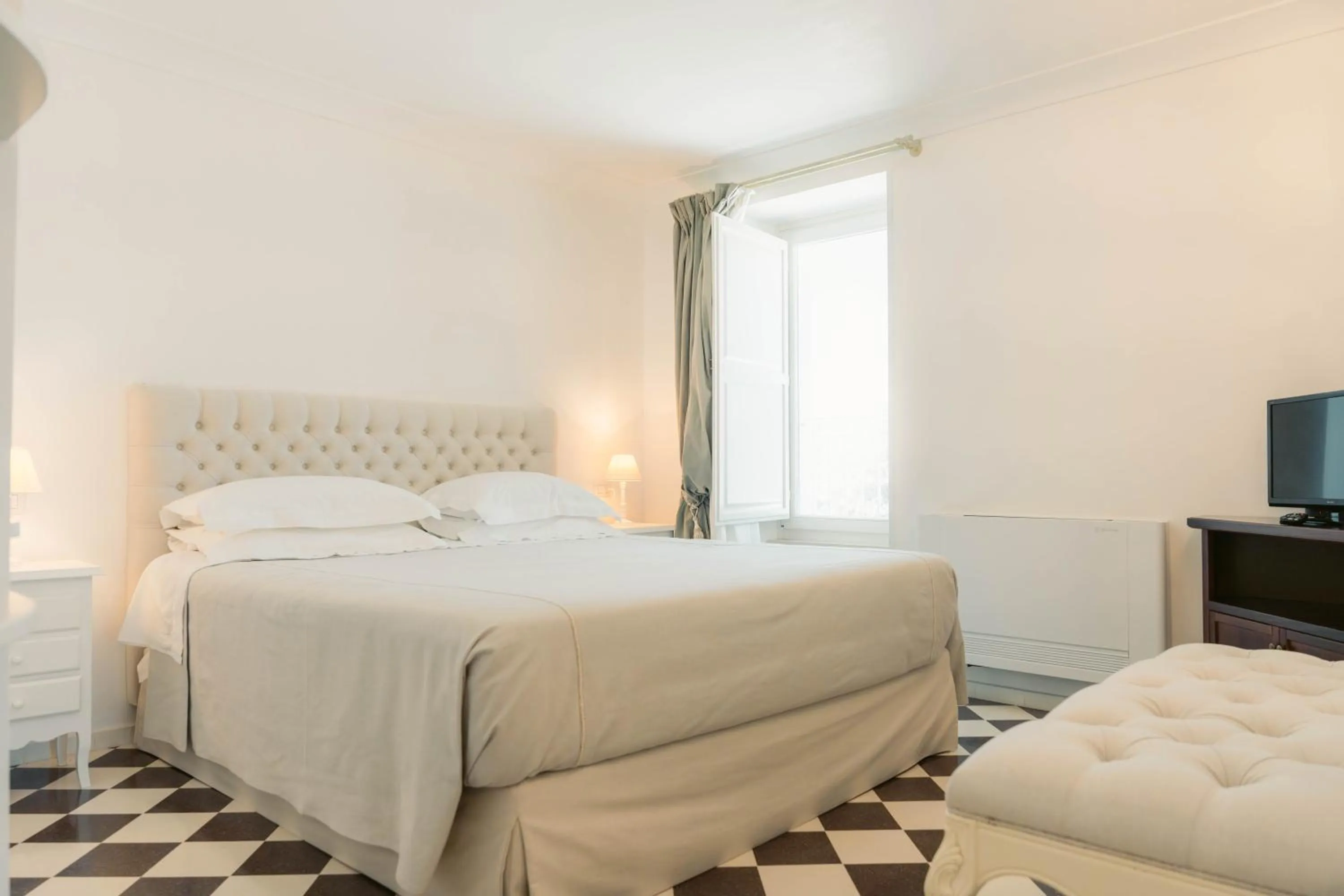 Bed in Leonardo Trulli Resort