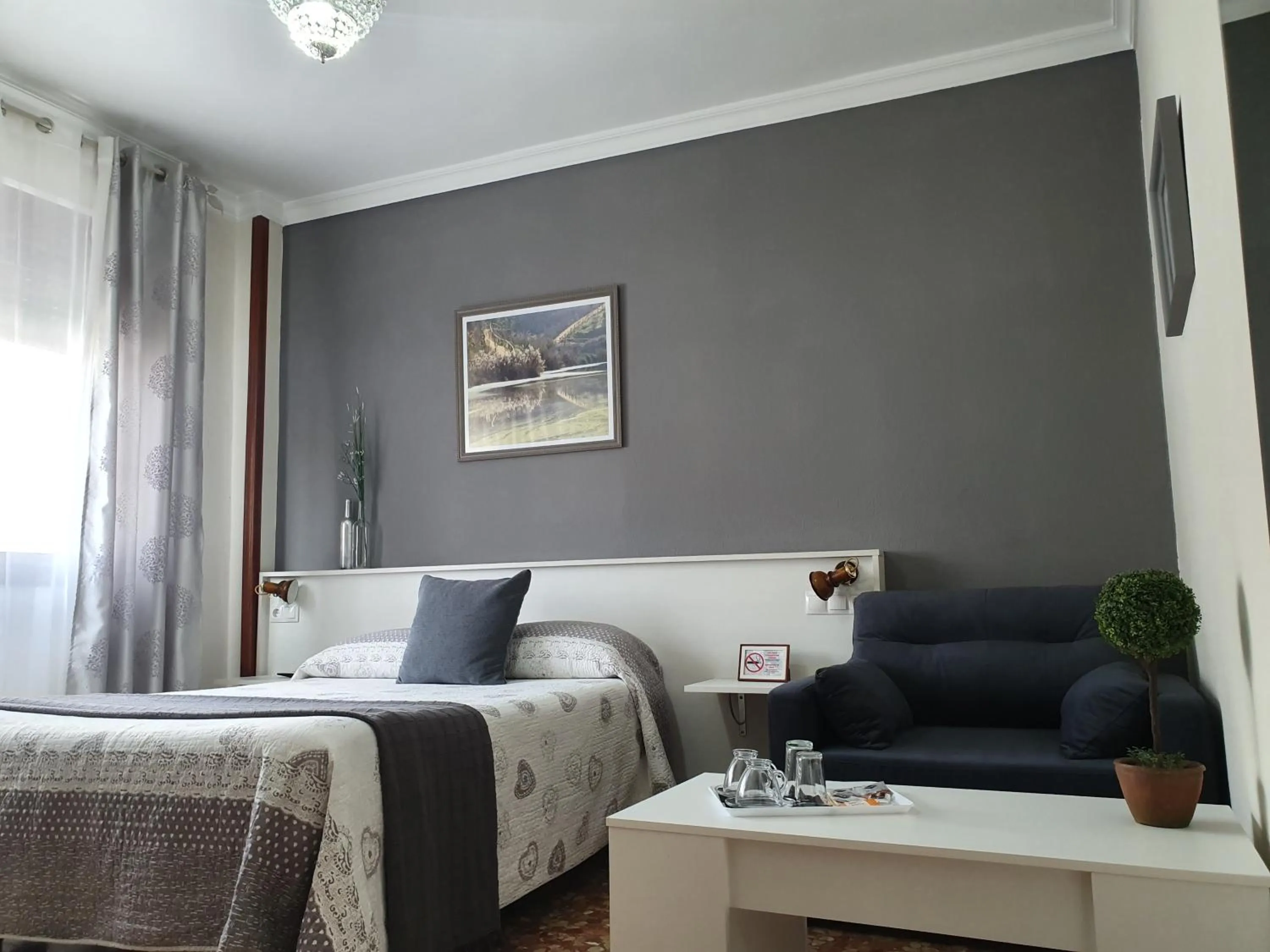 Bed in LUNA-Guest Rooms