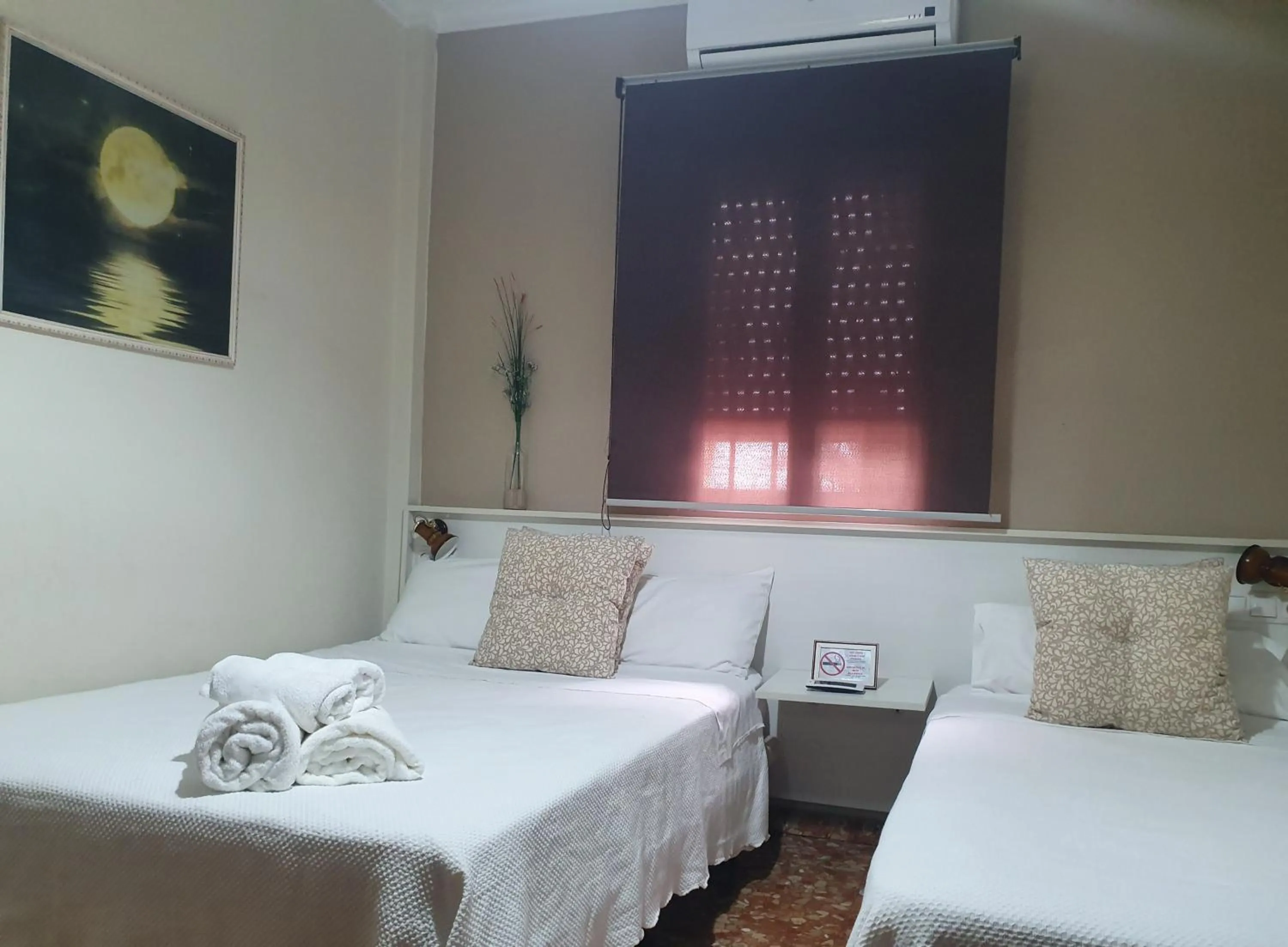 Bed in LUNA-Guest Rooms