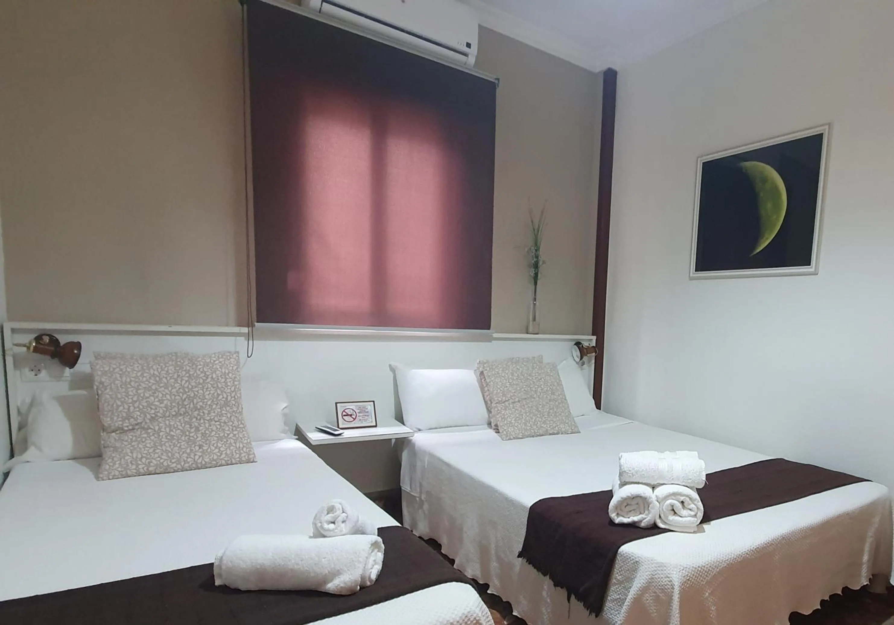 Bed in LUNA-Guest Rooms