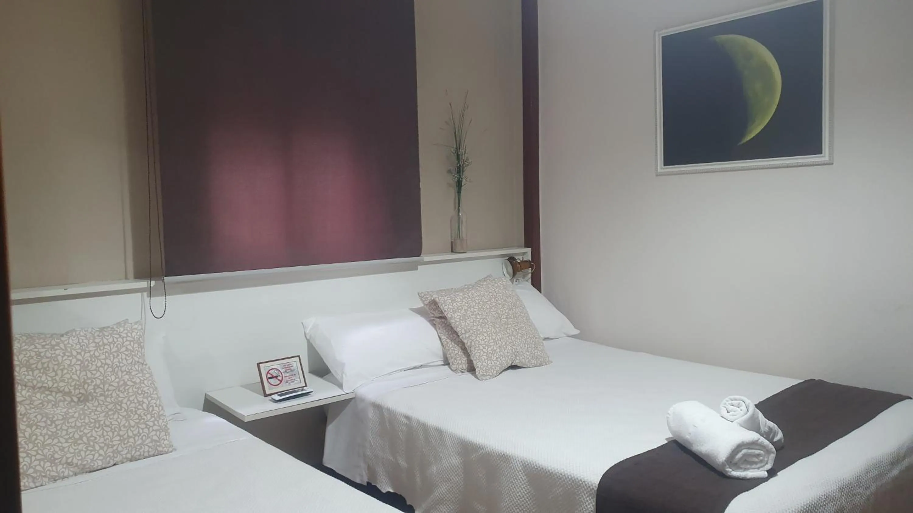 Bed in LUNA-Guest Rooms