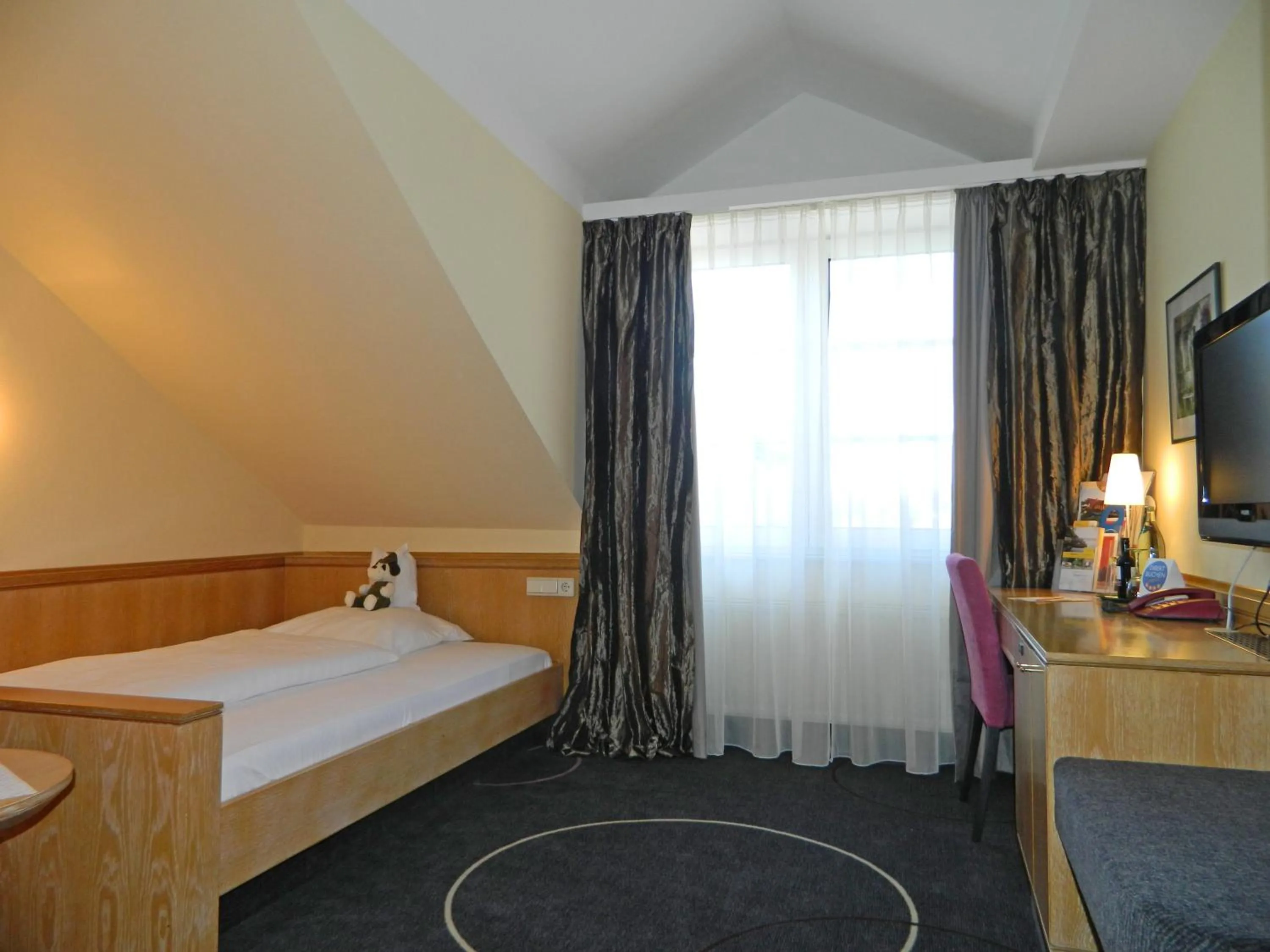 Bed in Köhlers Forsthaus Wellness & Genuss Hotel