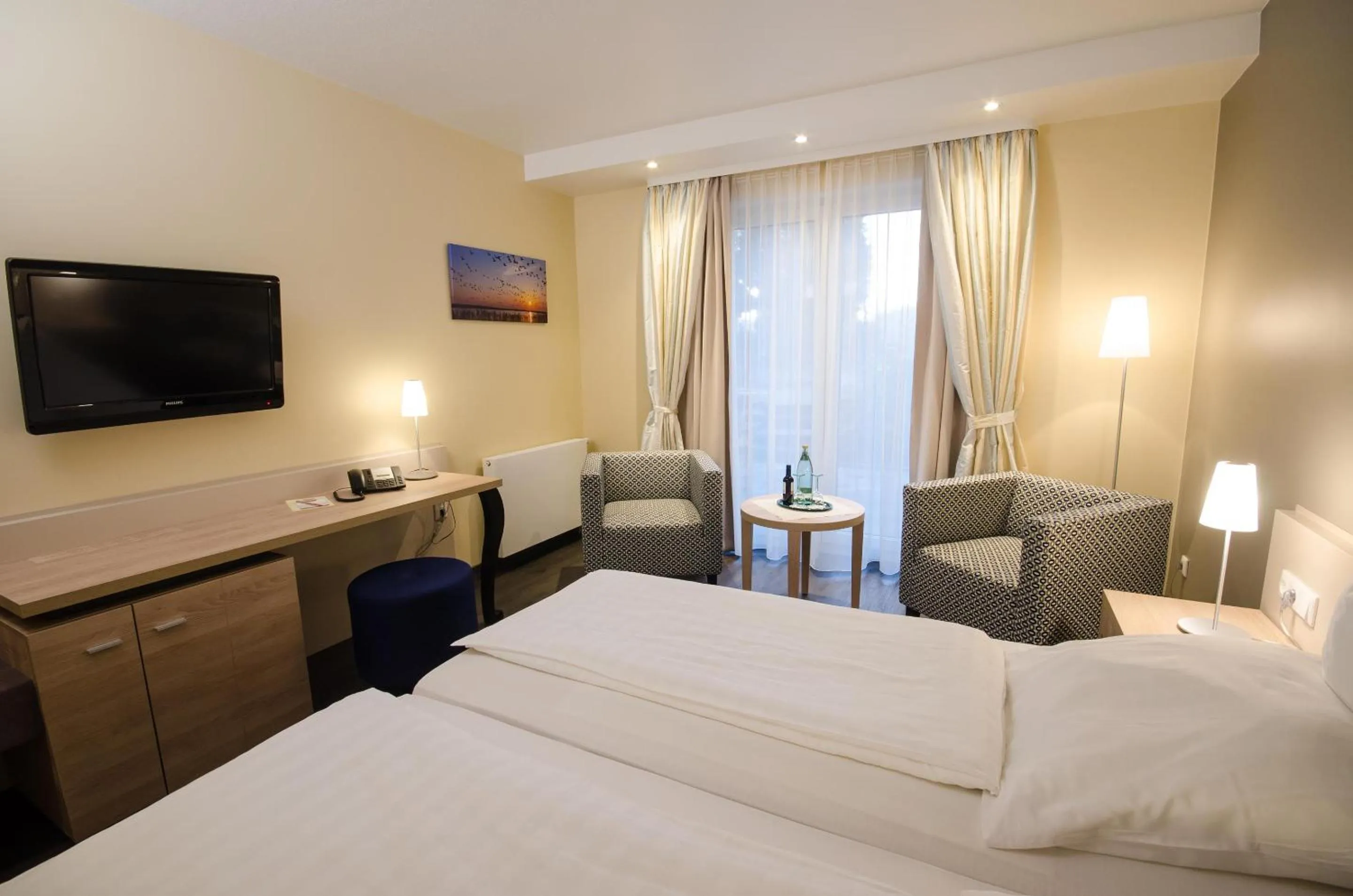 Bed in Köhlers Forsthaus Wellness & Genuss Hotel