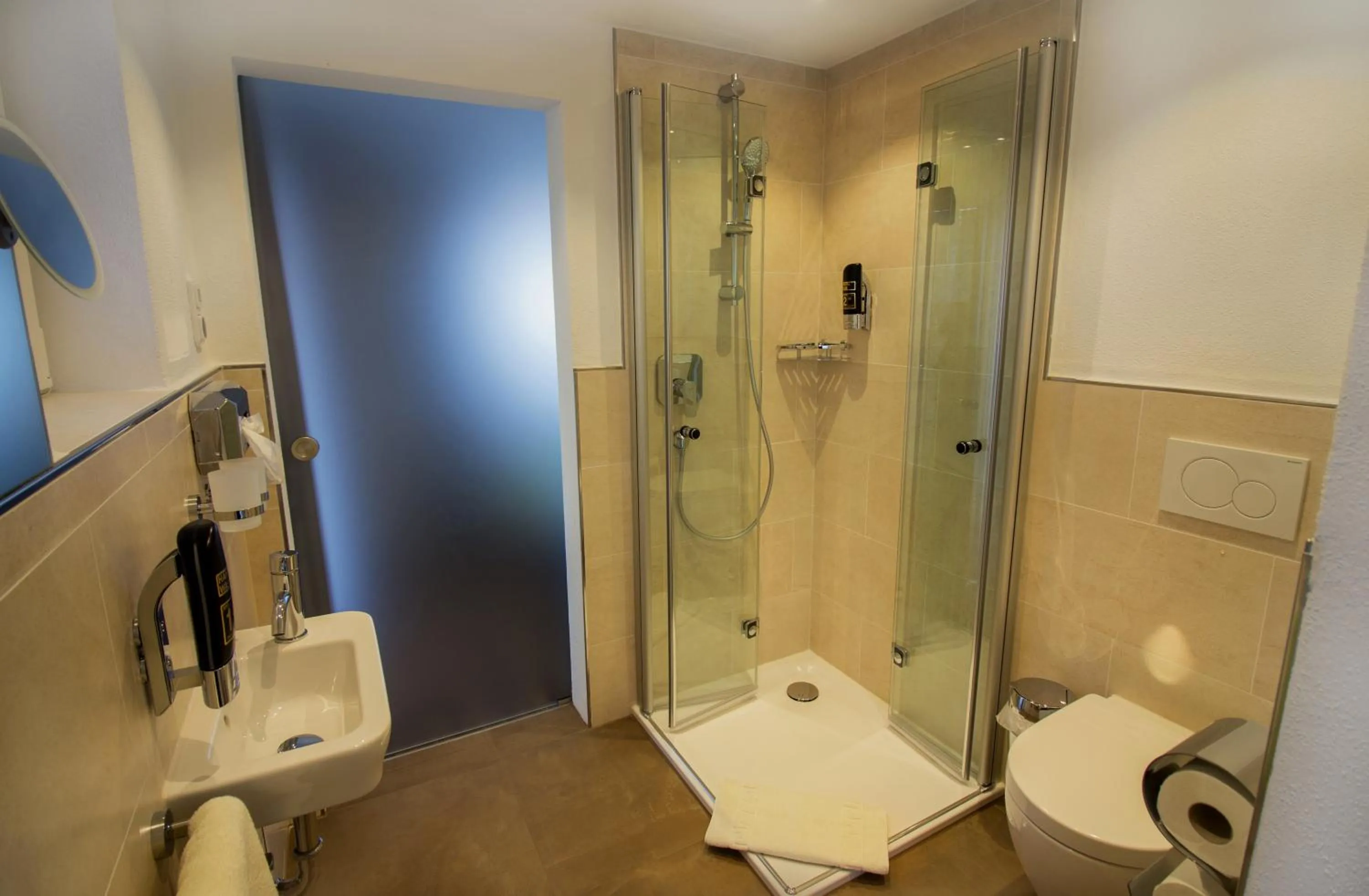 Bathroom in Hotel Alp Inn - Chiemgaukarte inclusive