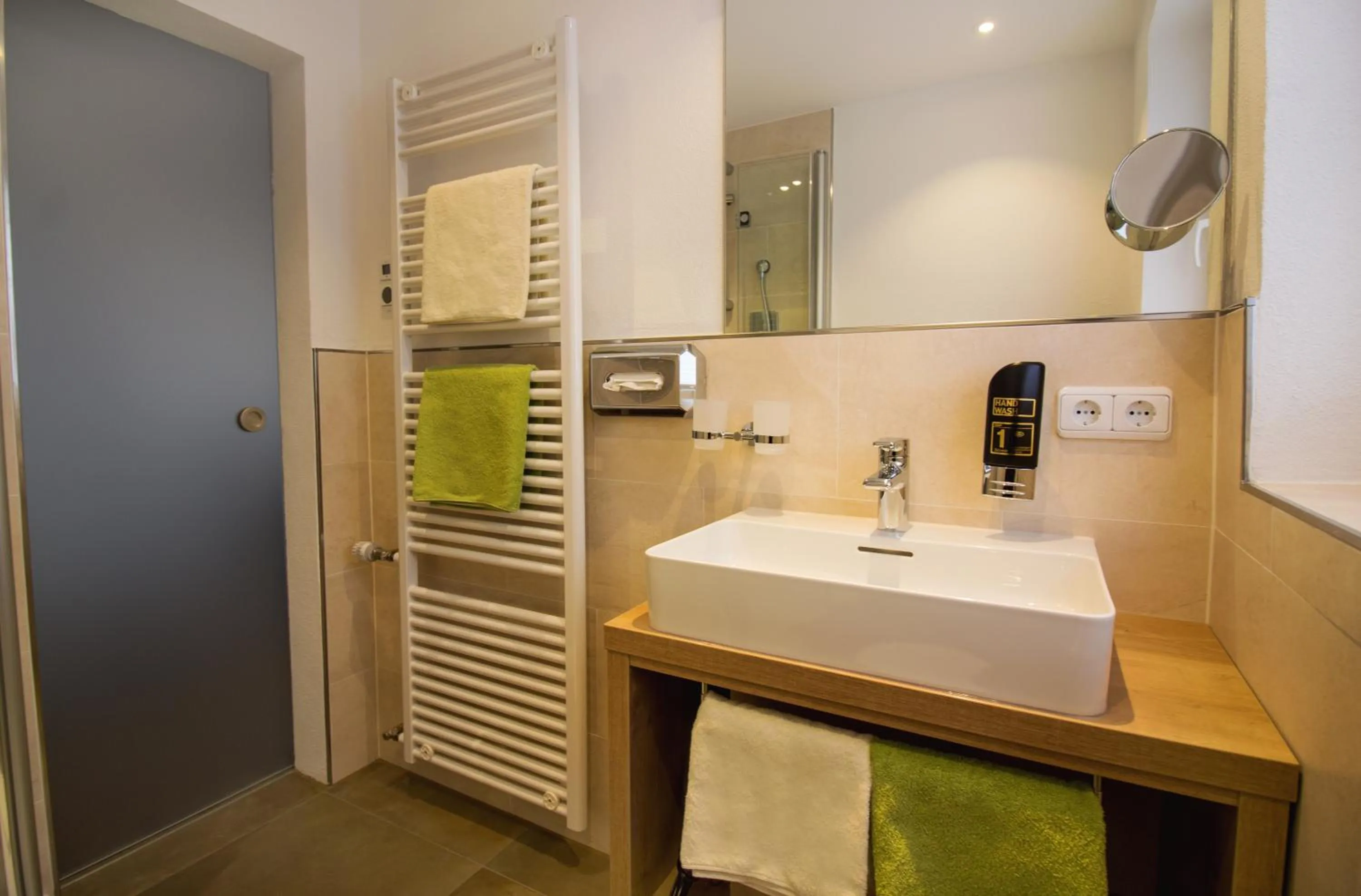 Bathroom in Hotel Alp Inn - Chiemgaukarte inclusive