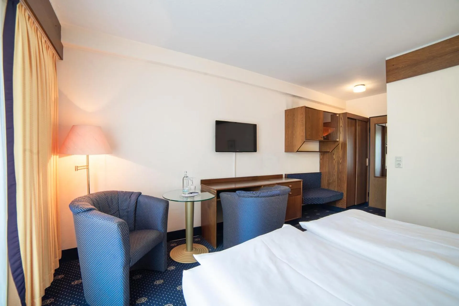 Bed in City Club Hotel