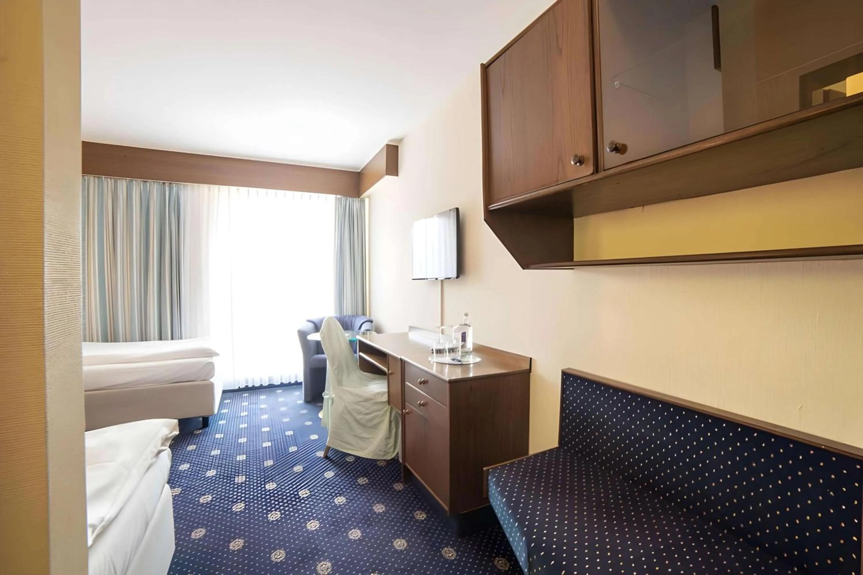 Photo of the whole room, Bed in City Club Hotel