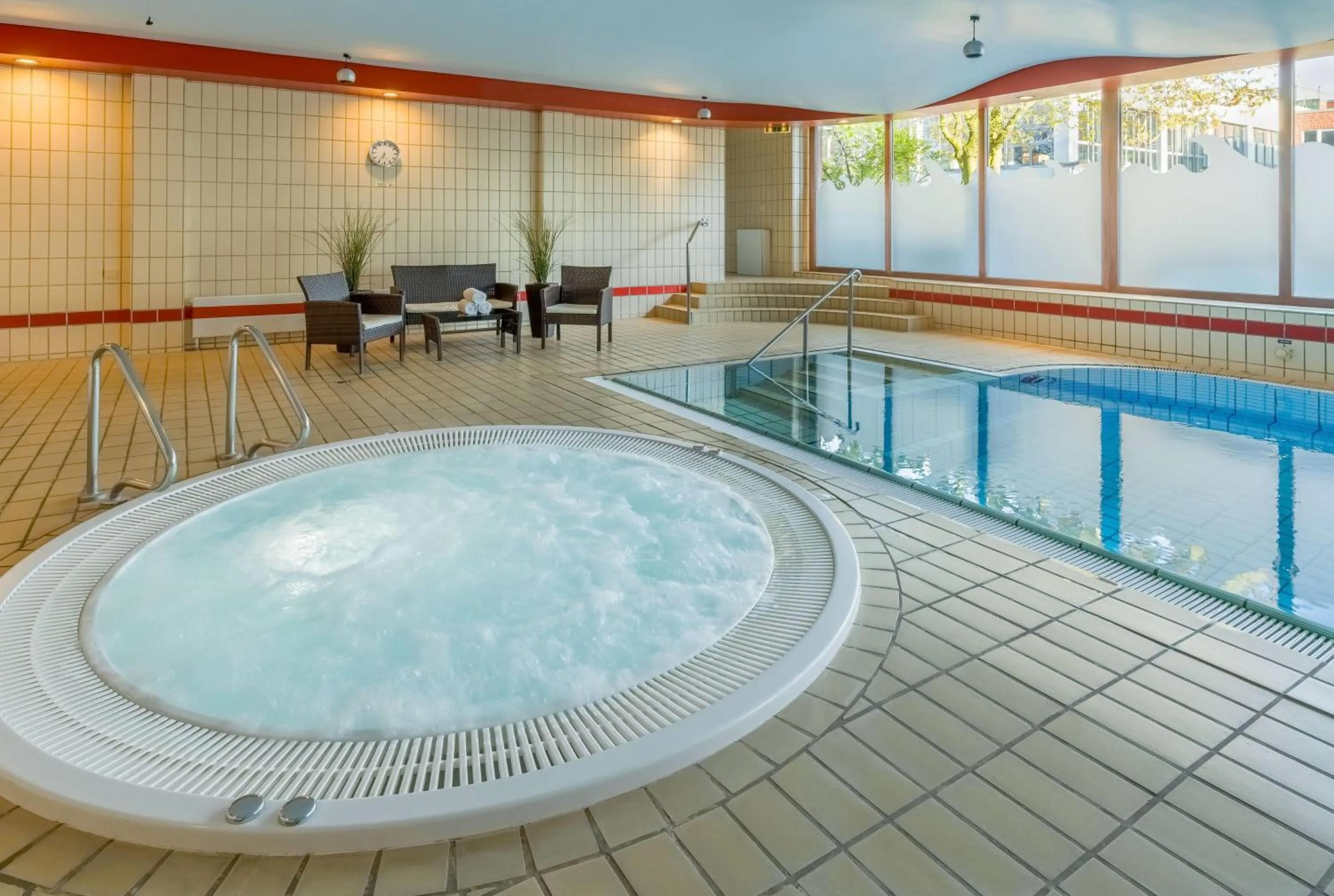 Pool view in Aspire Oldenburg, Trademark Collection by Wyndham