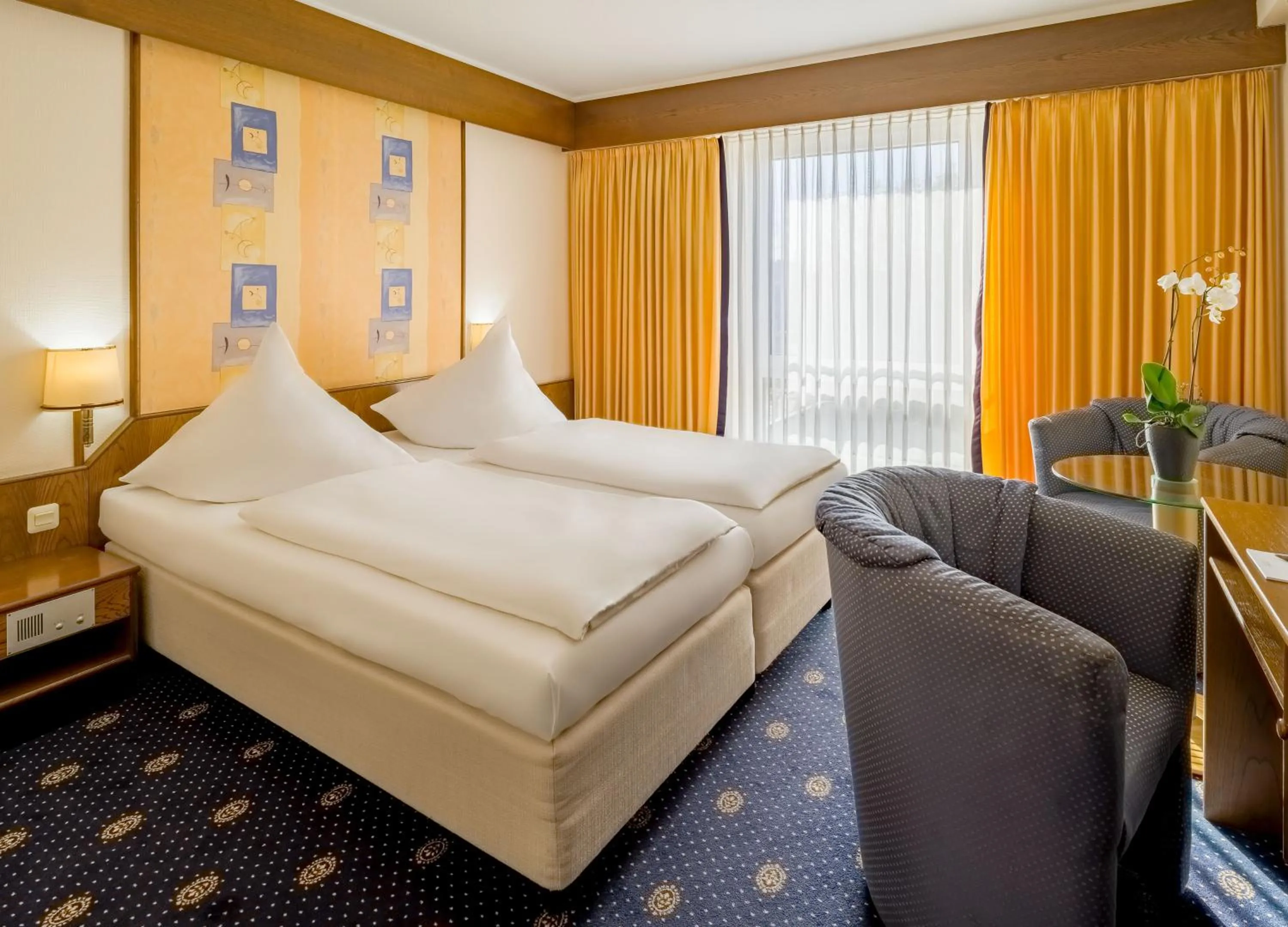 Photo of the whole room, Bed in Aspire Oldenburg, Trademark Collection by Wyndham