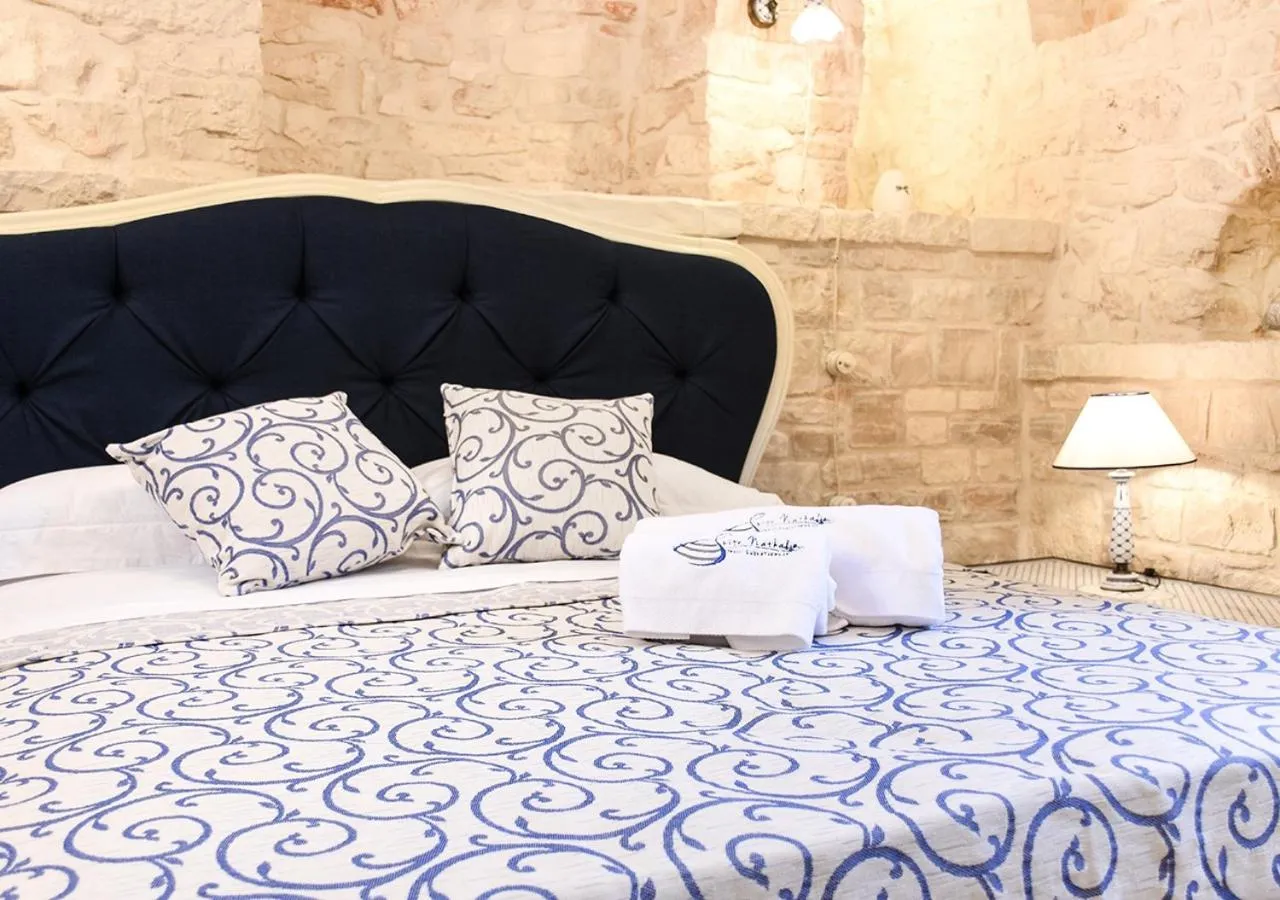 Bed in Trulli e Puglia Luxury Suite