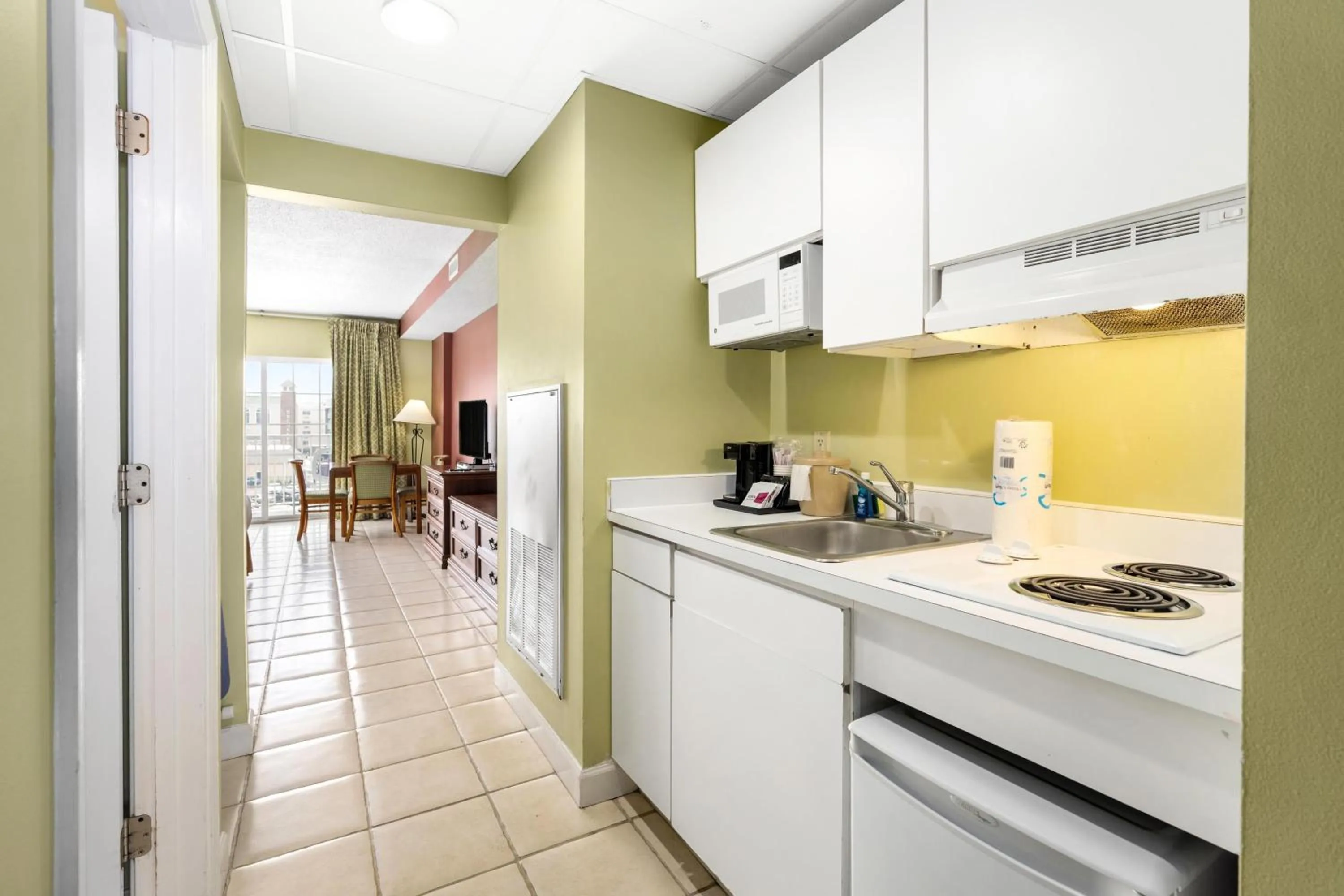 Kitchen or kitchenette in Tidelands Caribbean Boardwalk Hotel and Suites