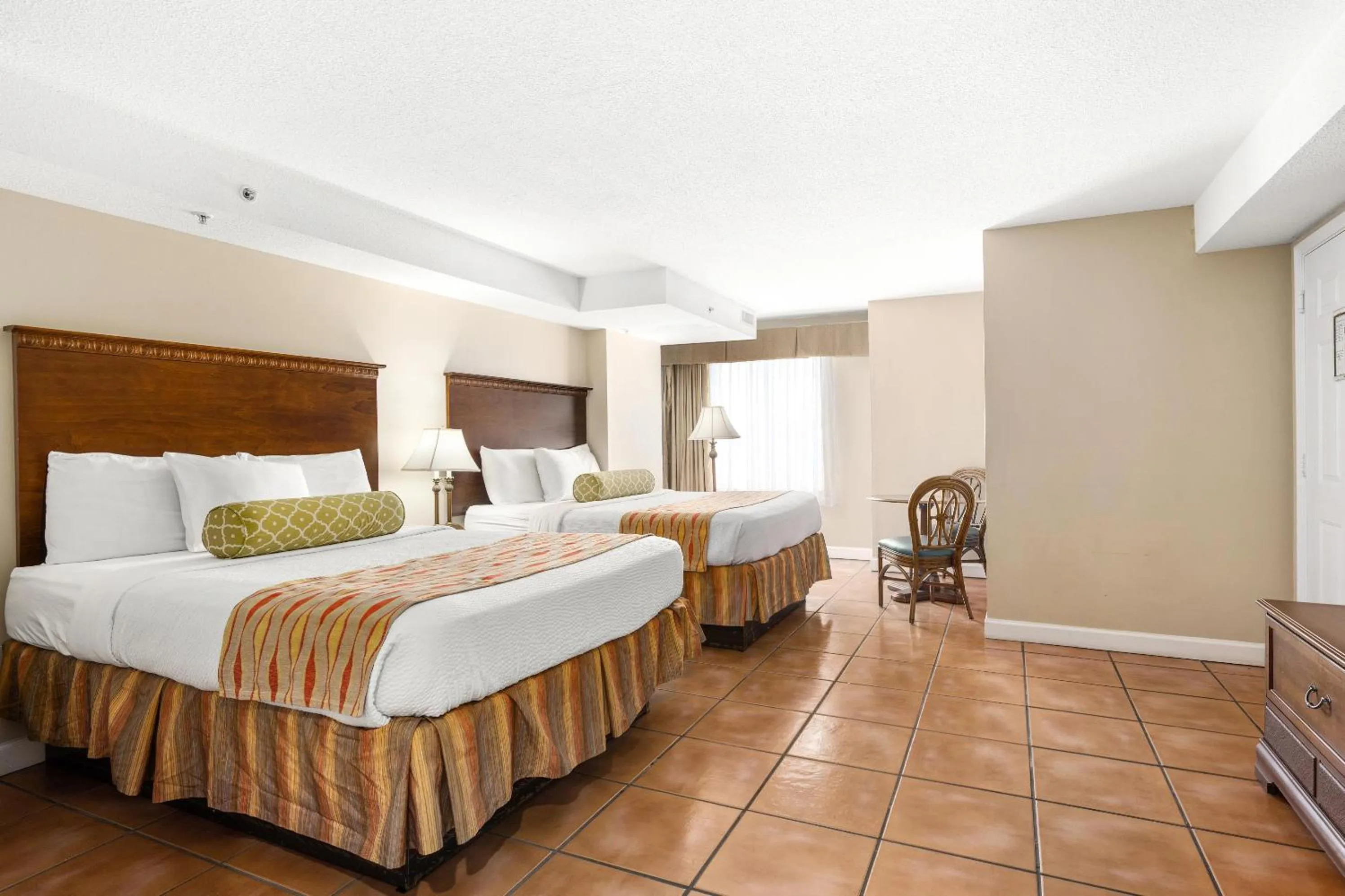 Bedroom, Bed in Tidelands Caribbean Boardwalk Hotel and Suites