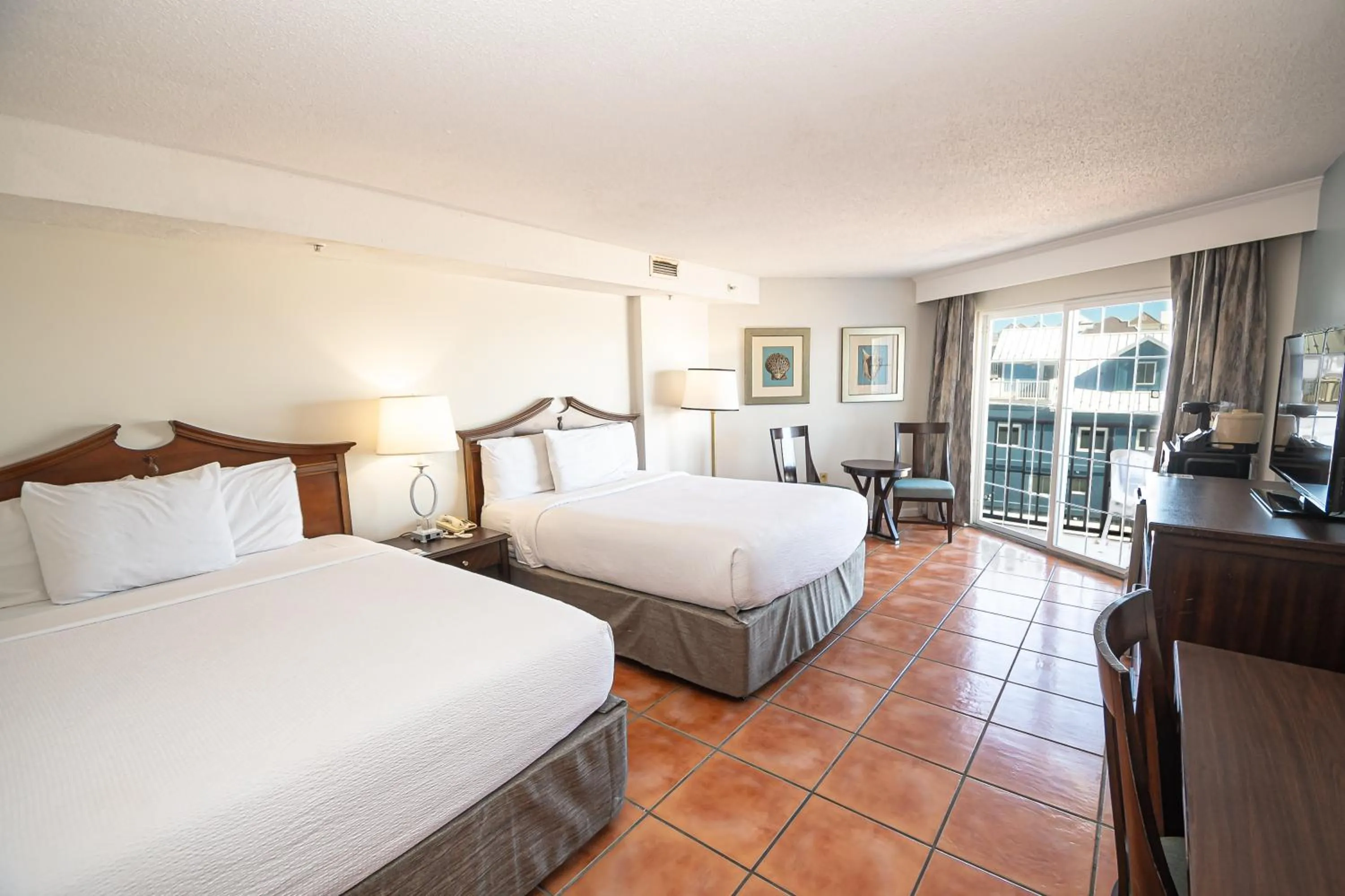 Bedroom, Bed in Tidelands Caribbean Boardwalk Hotel and Suites
