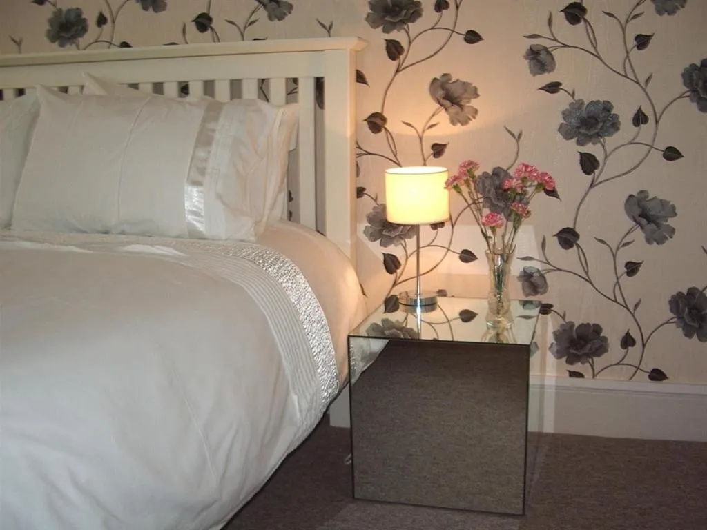 Bedroom in The Thirsty Scholar