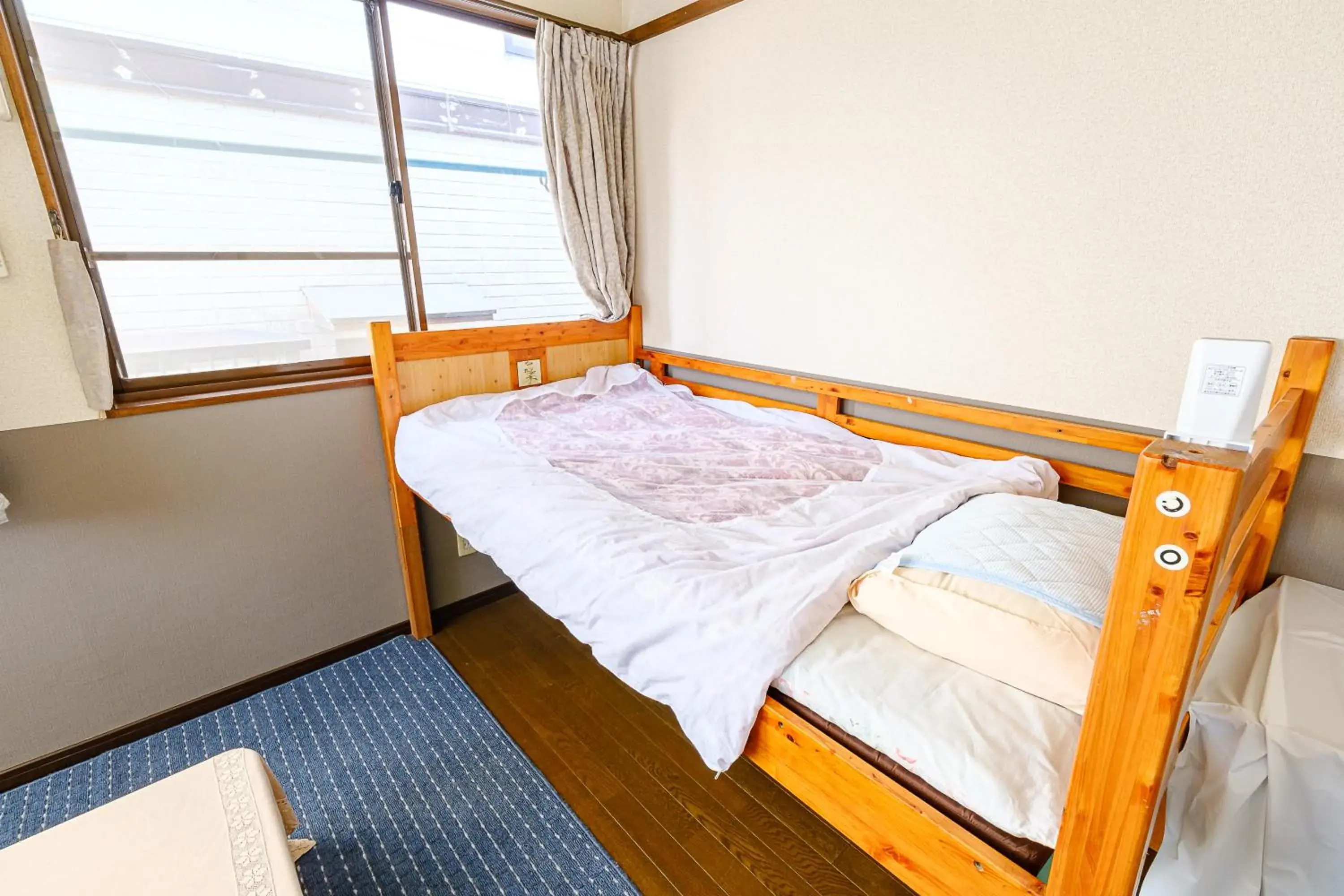Quadruple Room in 渡邊民泊 Quadruple Room in 渡邊民泊
