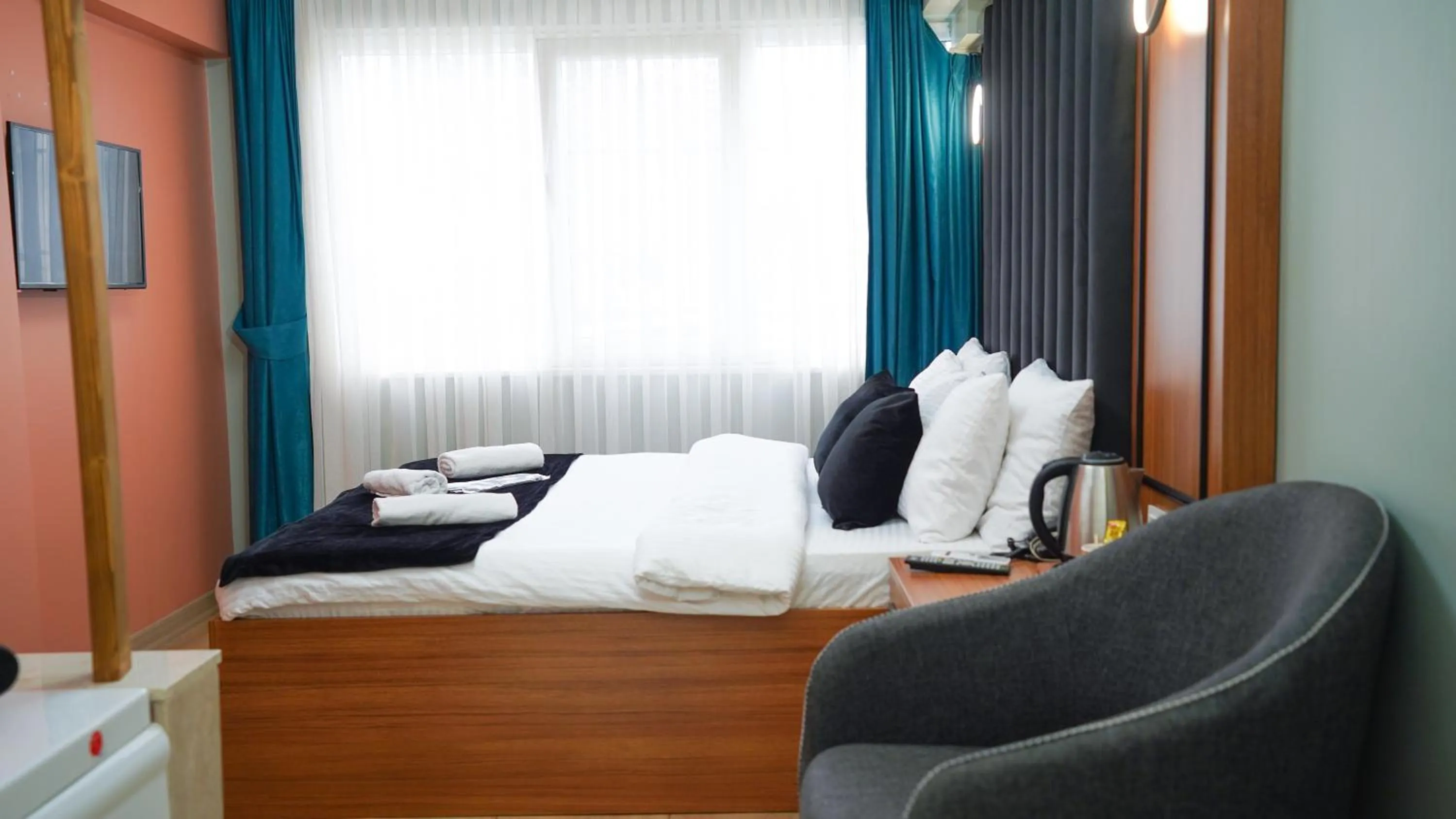 Bed in Luka Suit Hotel