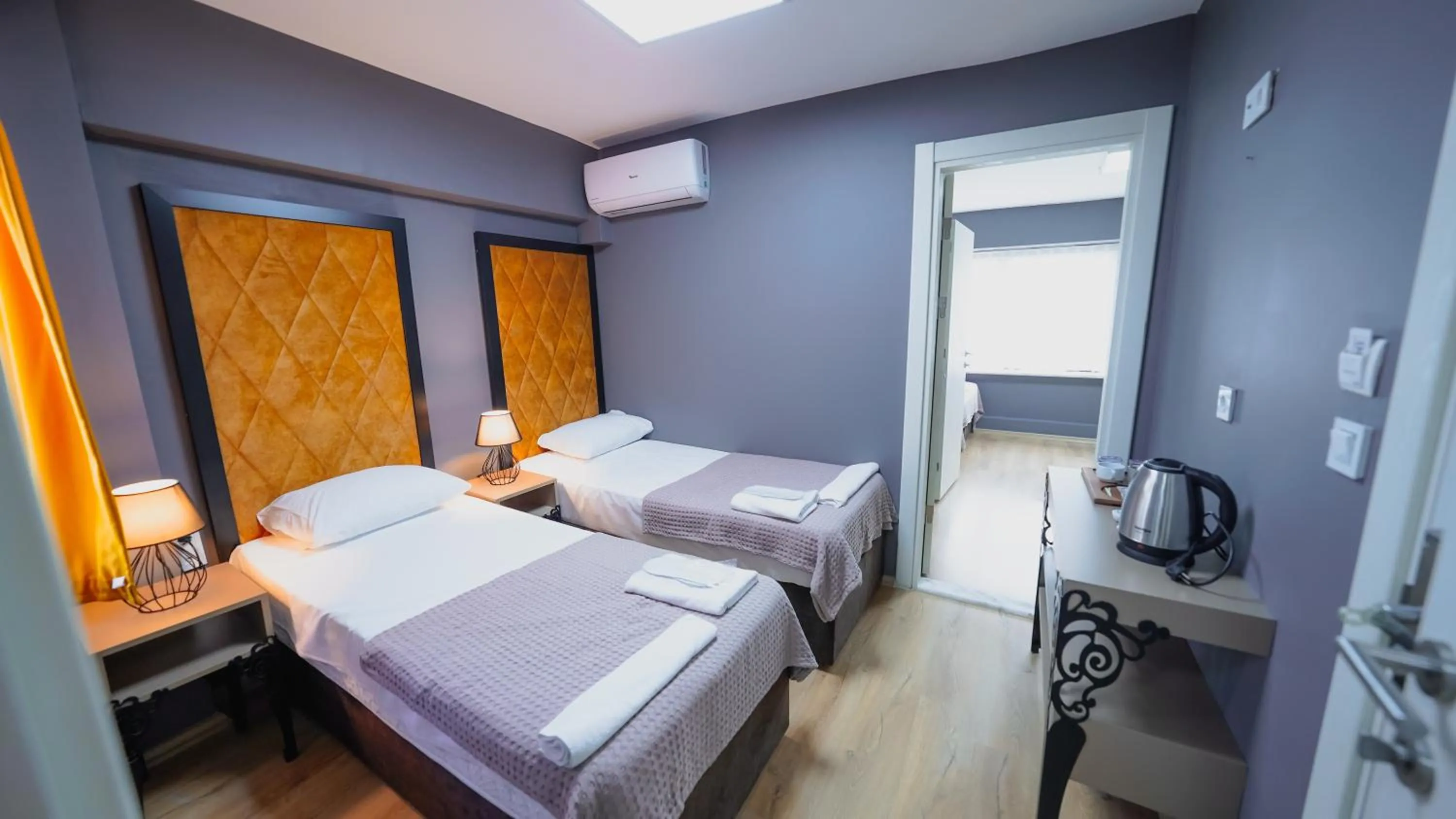 Bed in Luka Suit Hotel