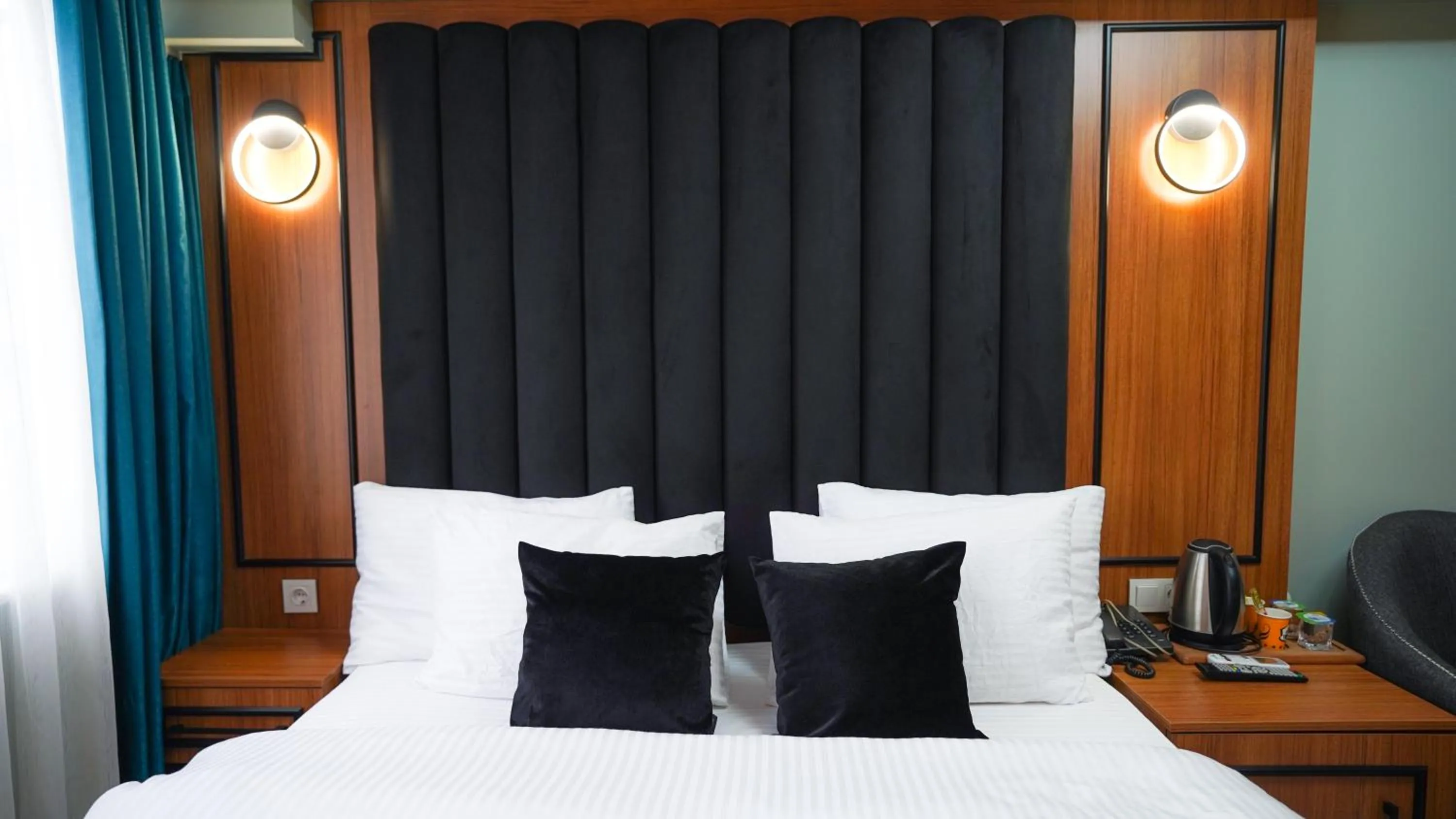 Bed in Luka Suit Hotel