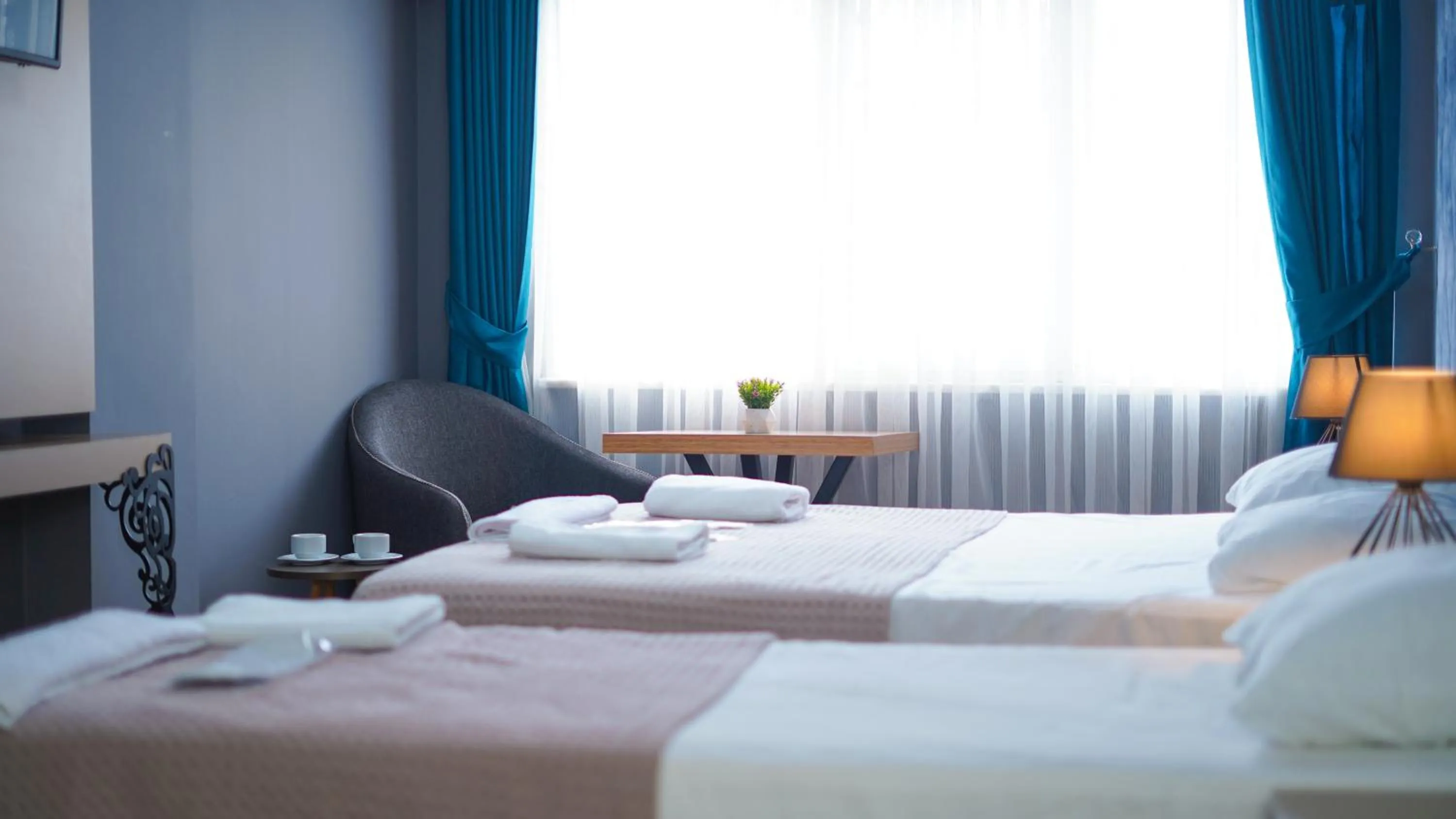 Bed in Luka Suit Hotel