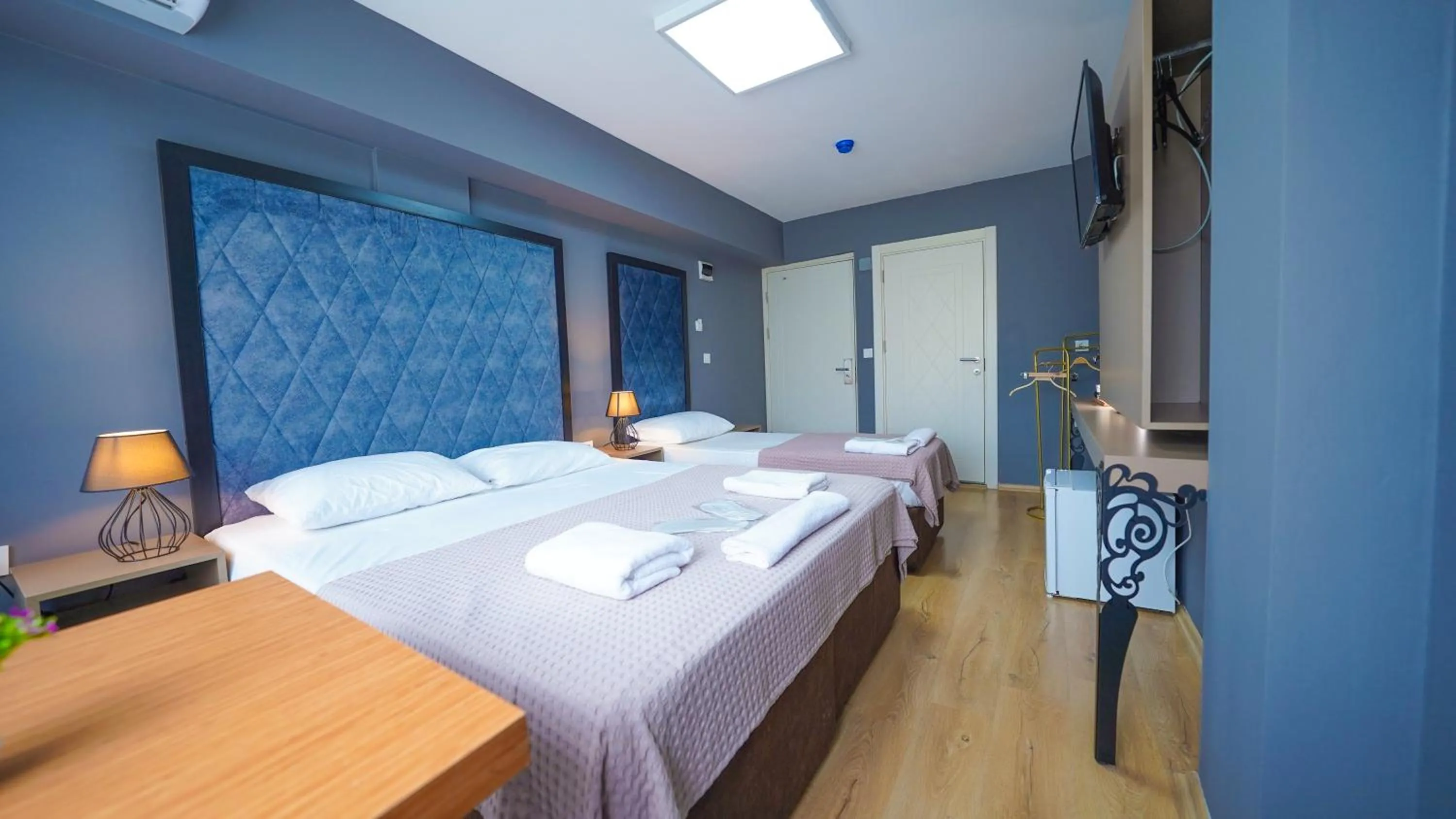 Bed in Luka Suit Hotel