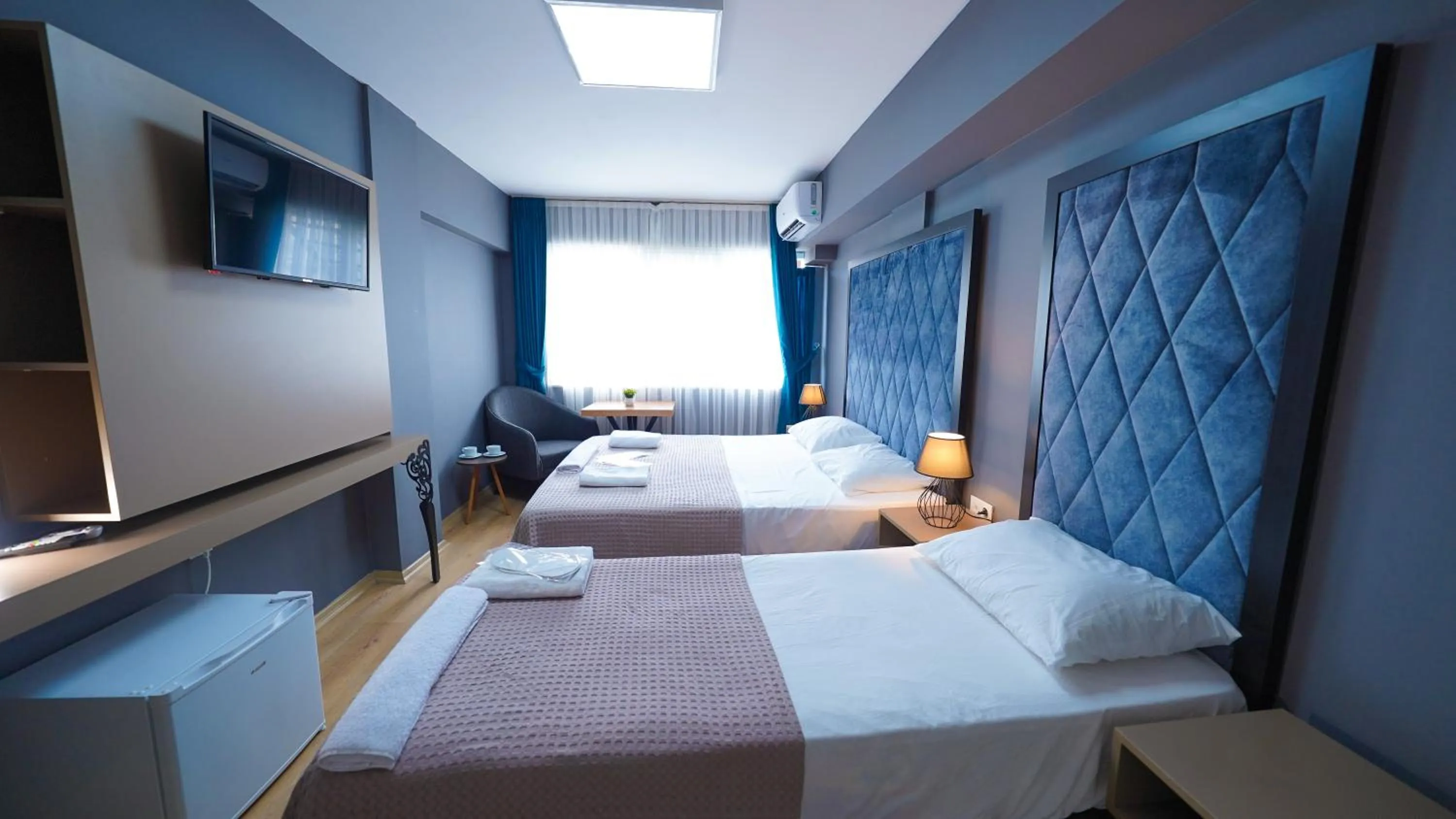 Bed in Luka Suit Hotel