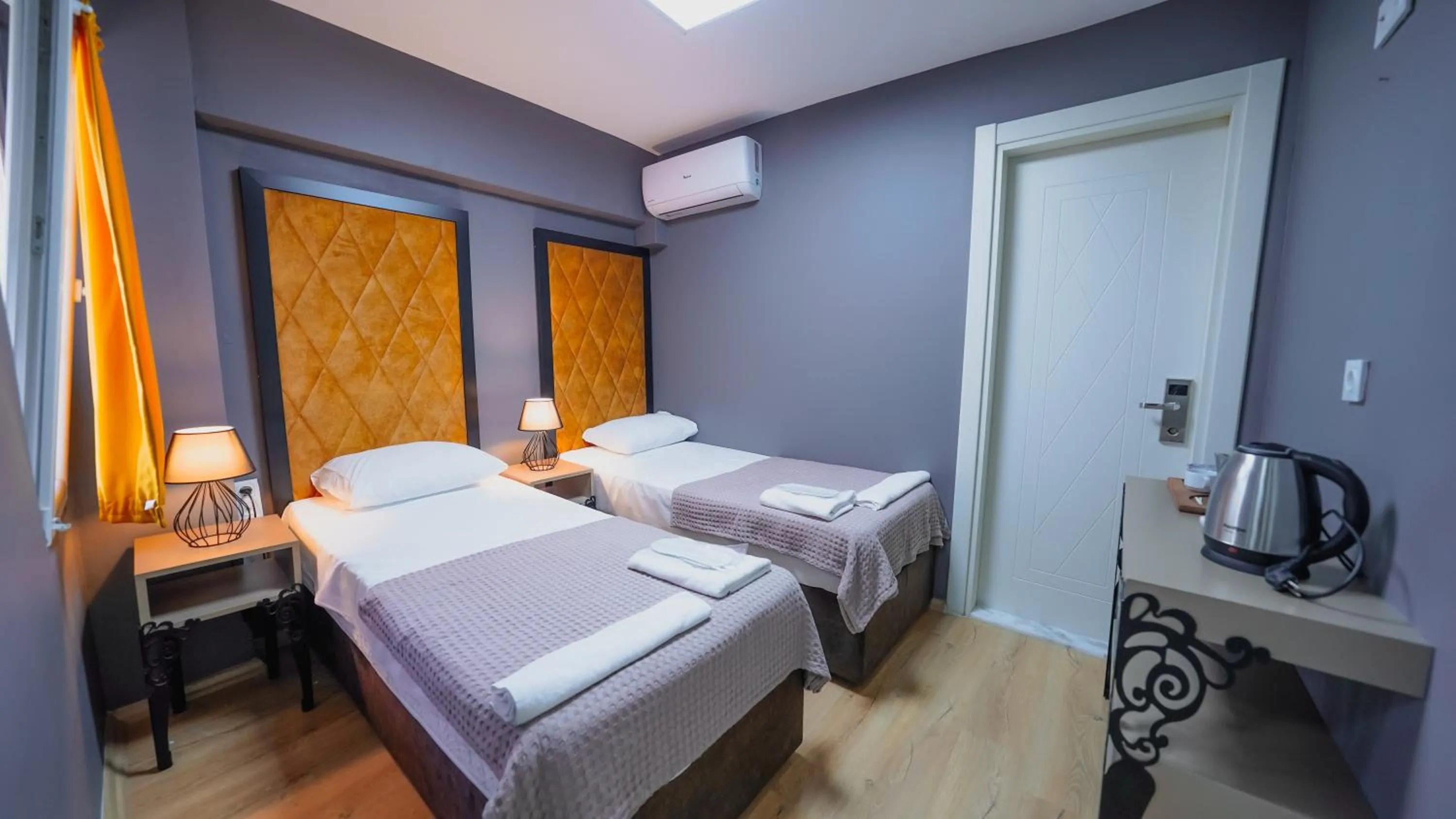 Bed in Luka Suit Hotel