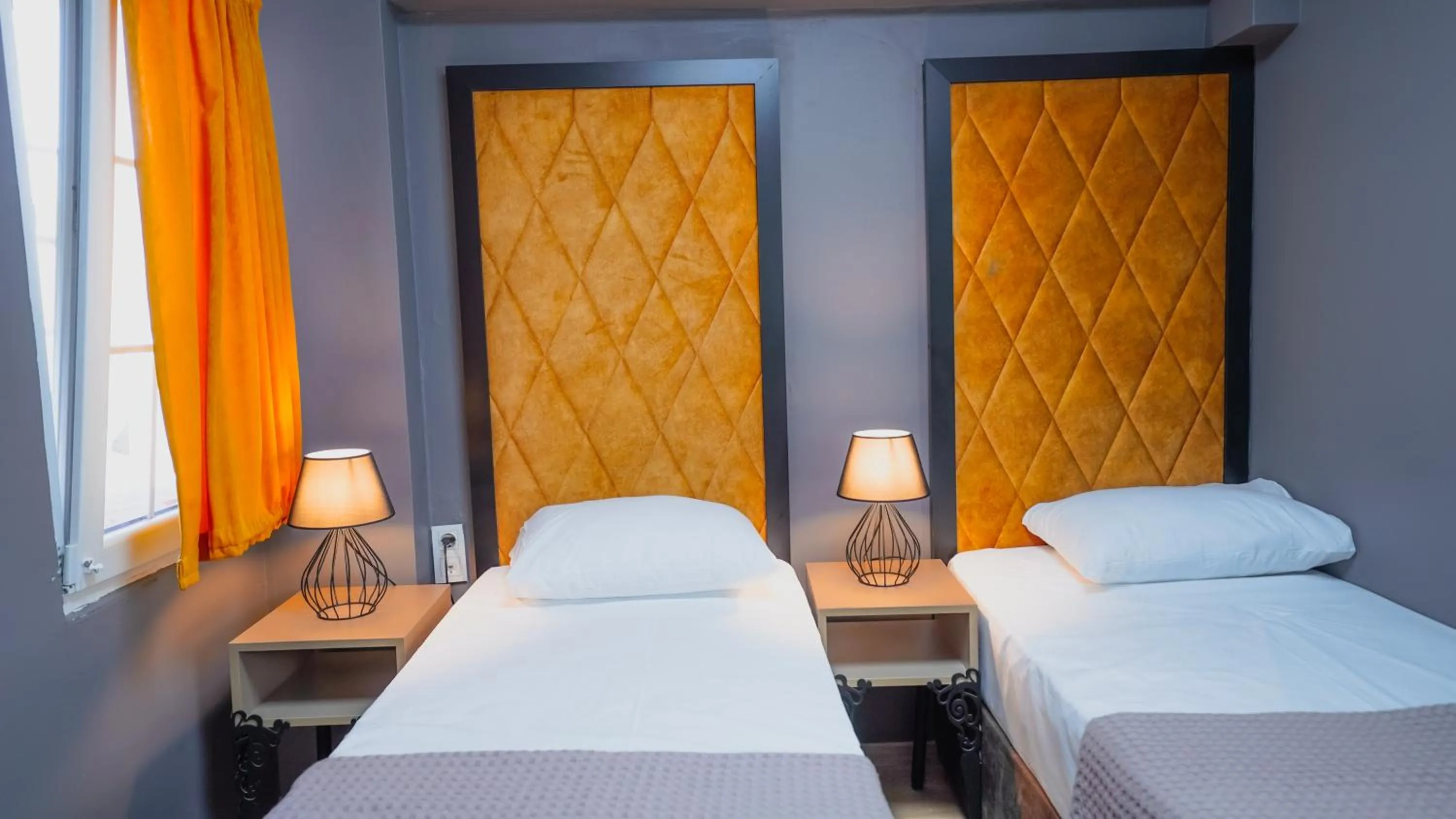 Bed in Luka Suit Hotel