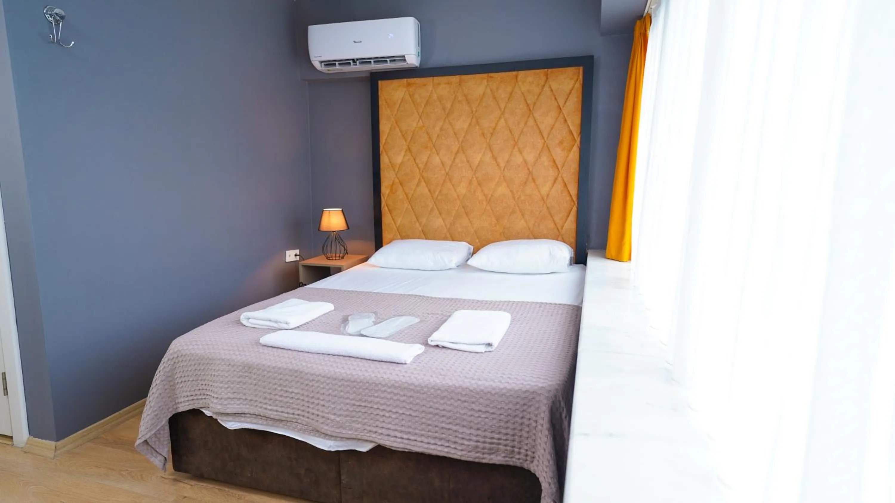 Bed in Luka Suit Hotel