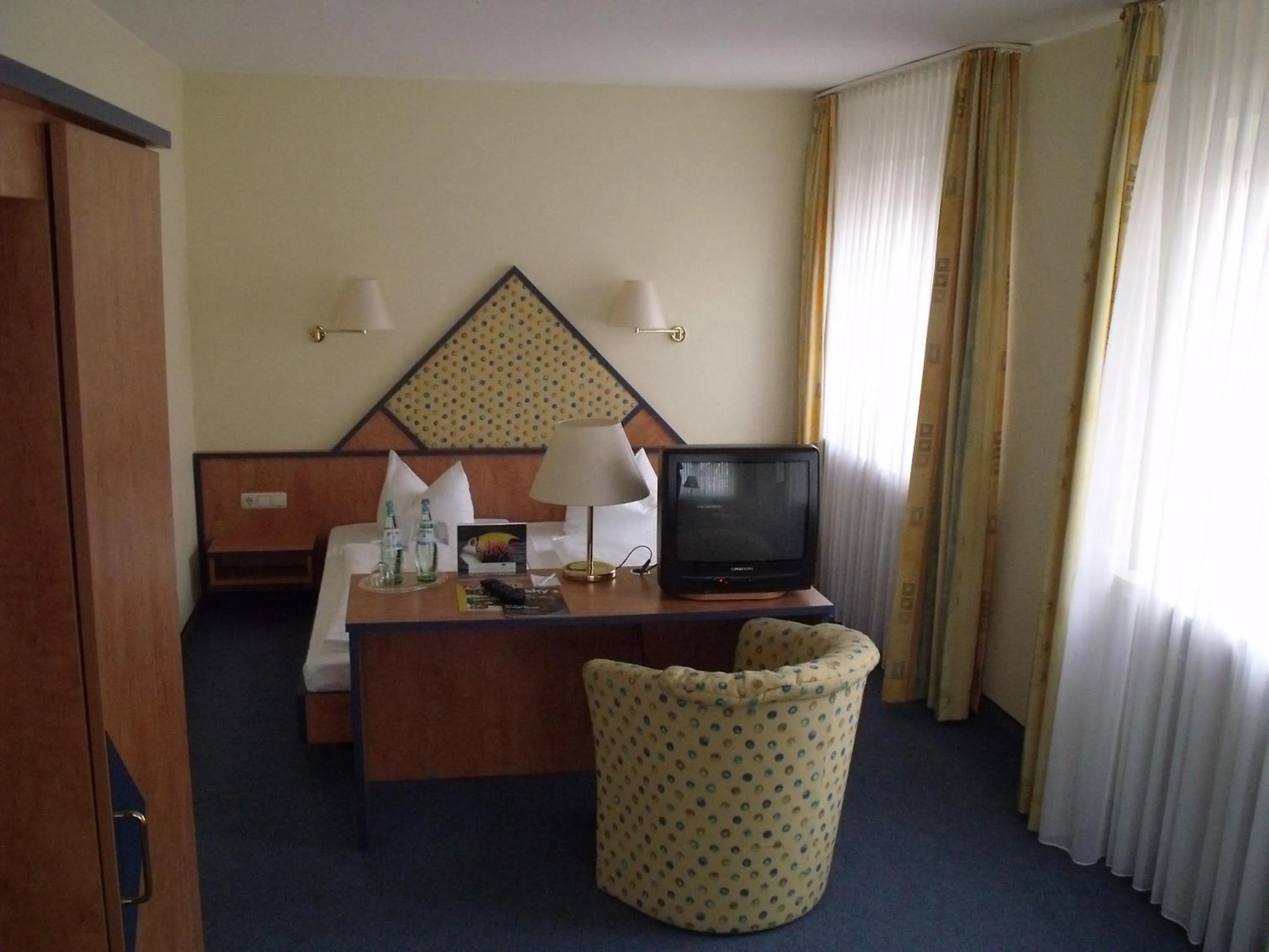 Bed in Hotel Alexander