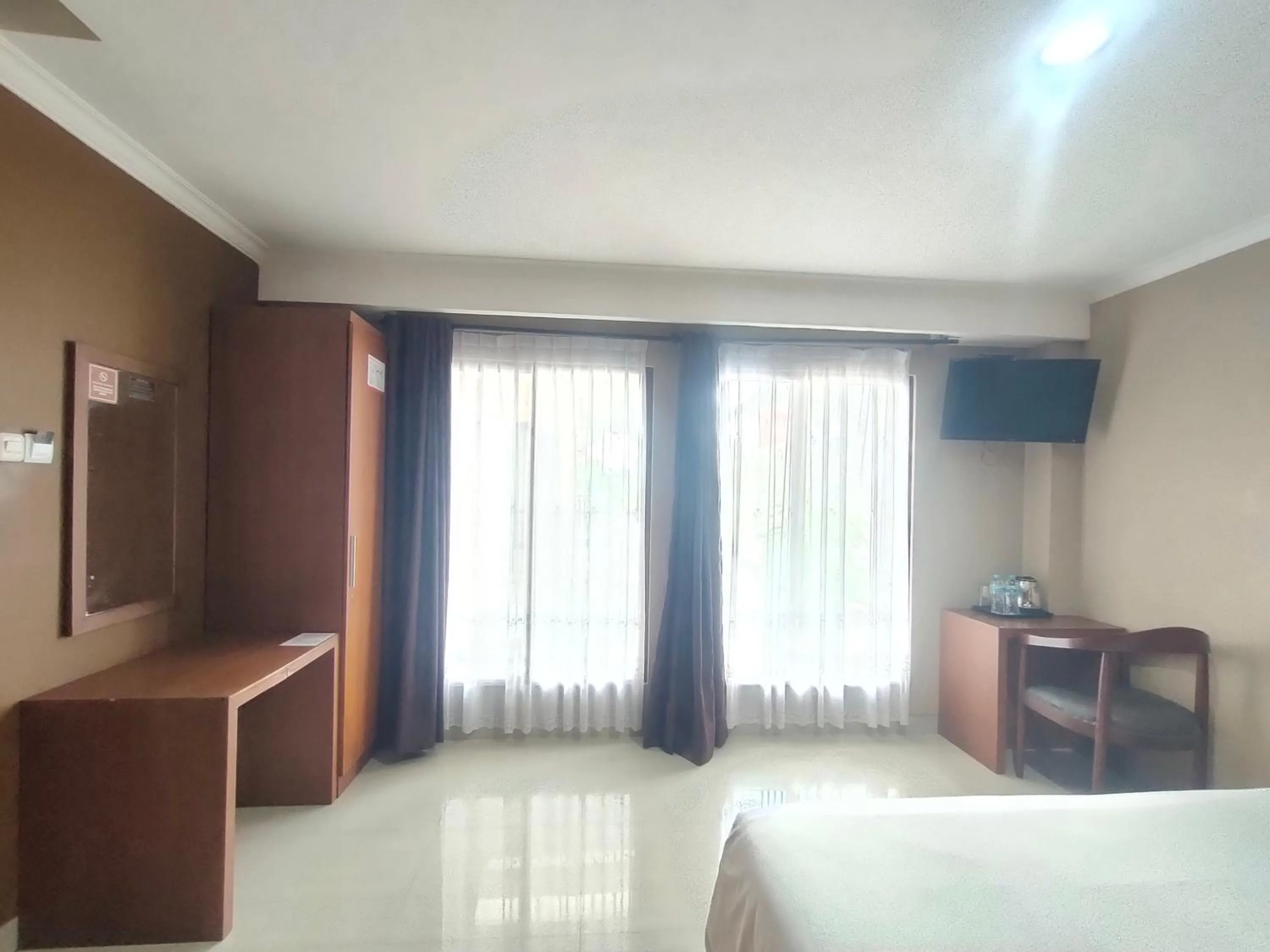 Property building, Bed in Votel Viure Hotel Jogjakarta