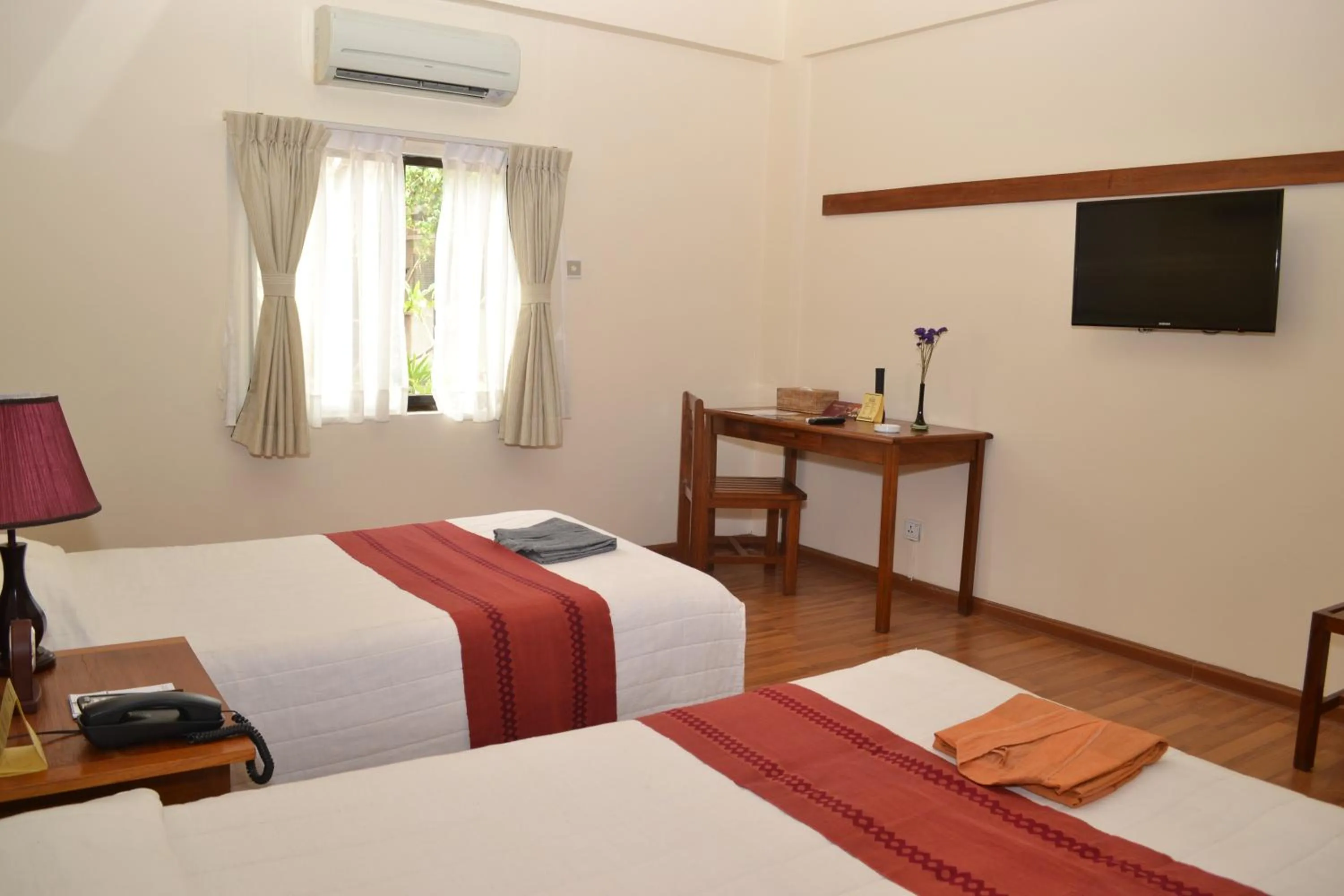 Bed in Bagan Thiripyitsaya Sanctuary Resort