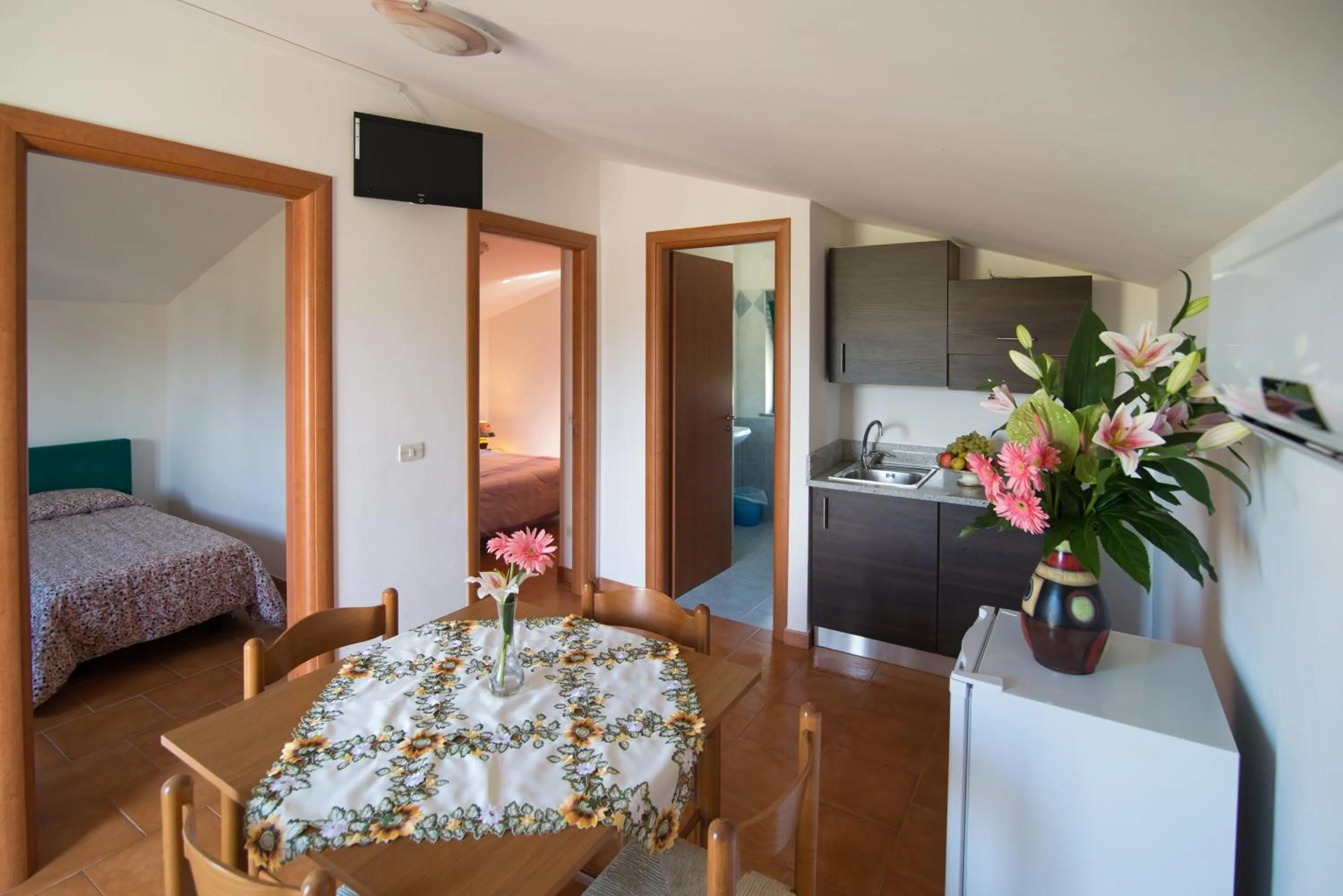 Kitchen or kitchenette, Bed in Villaggio Alkantara