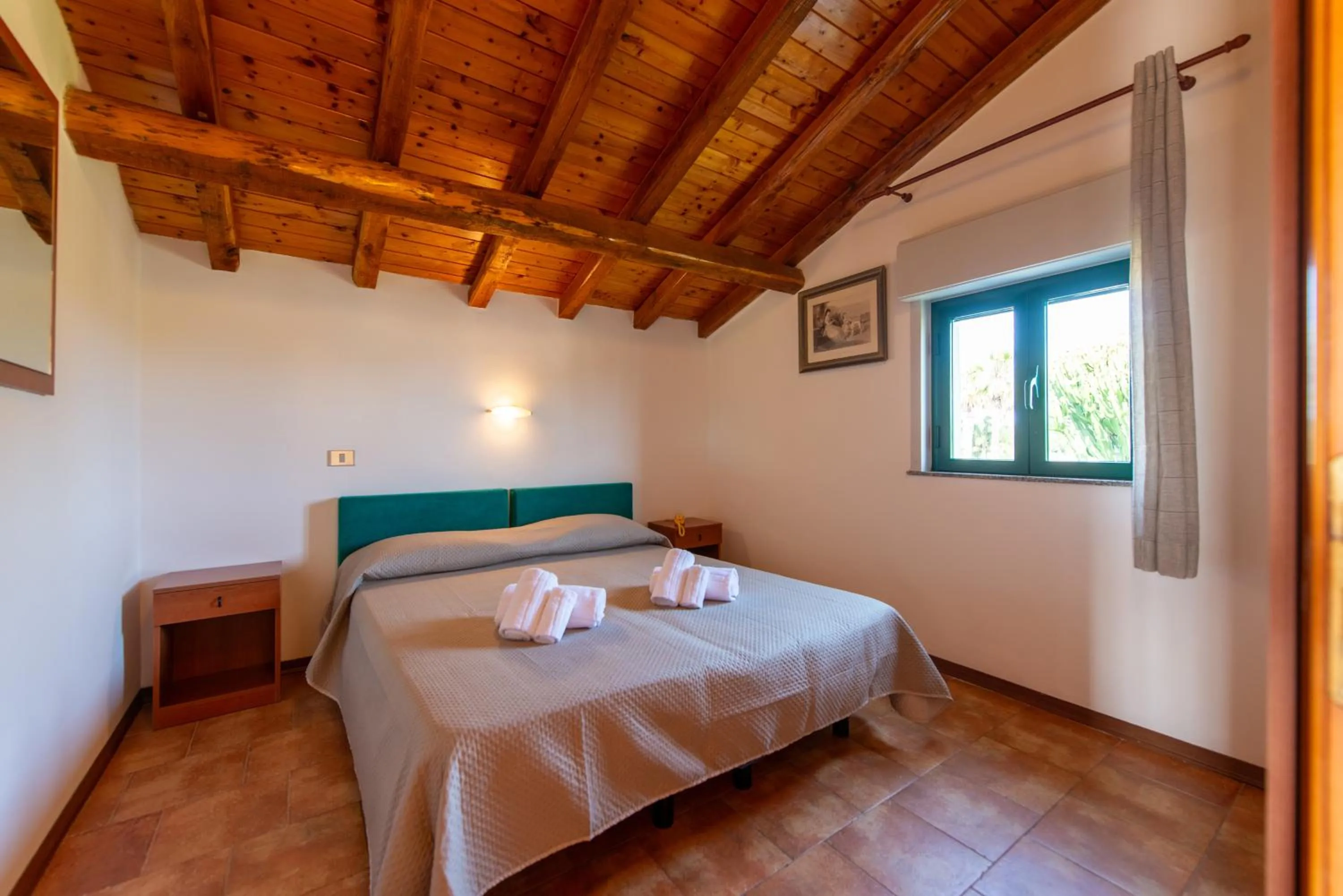 Bed in Villaggio Alkantara