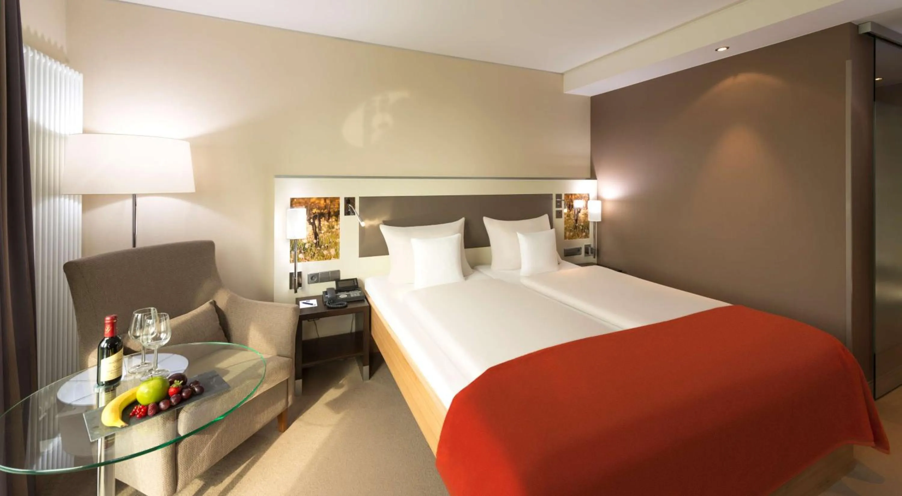 Photo of the whole room, Bed in Dorint Thermenhotel Freiburg