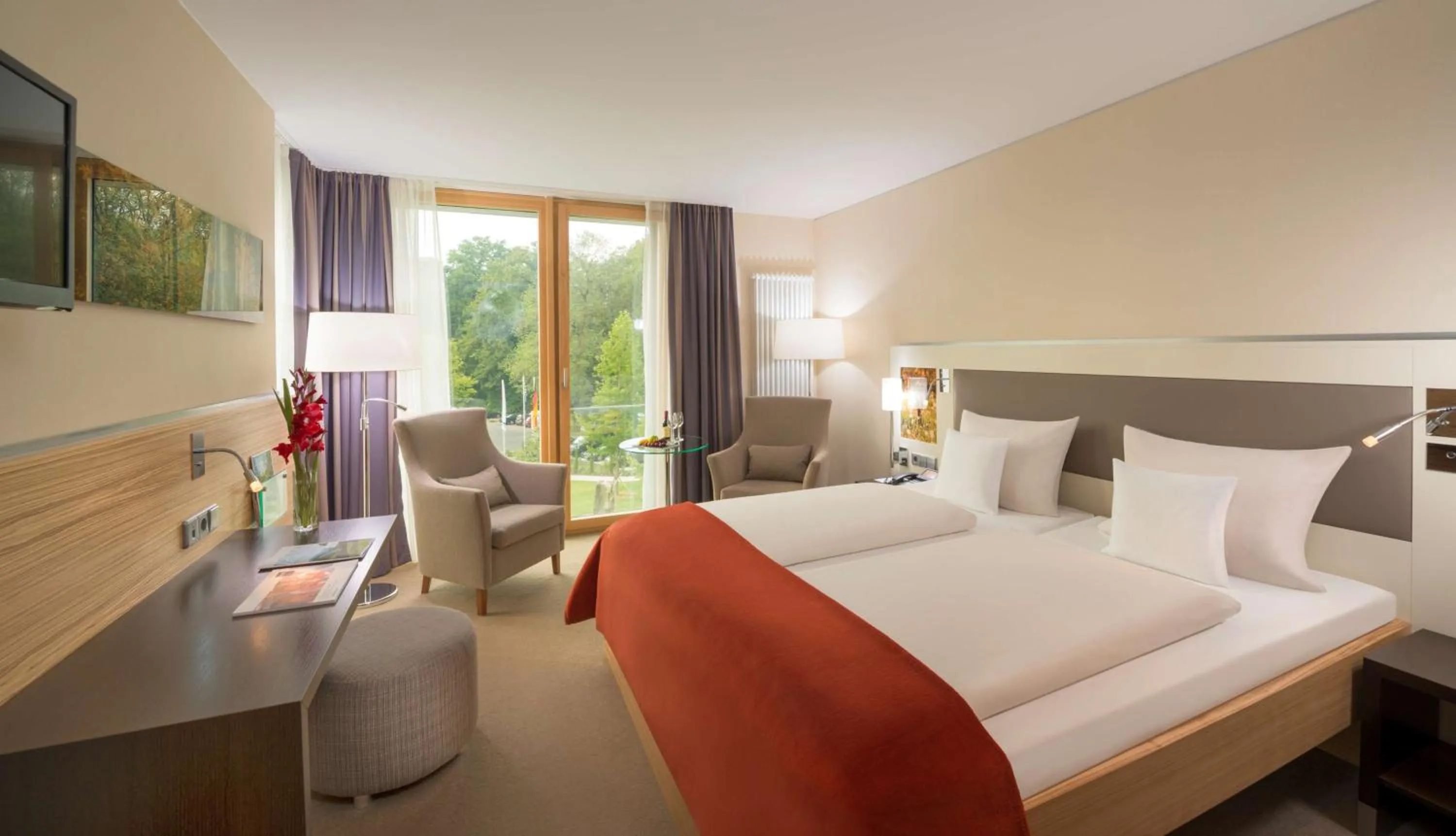 Photo of the whole room, Bed in Dorint Thermenhotel Freiburg